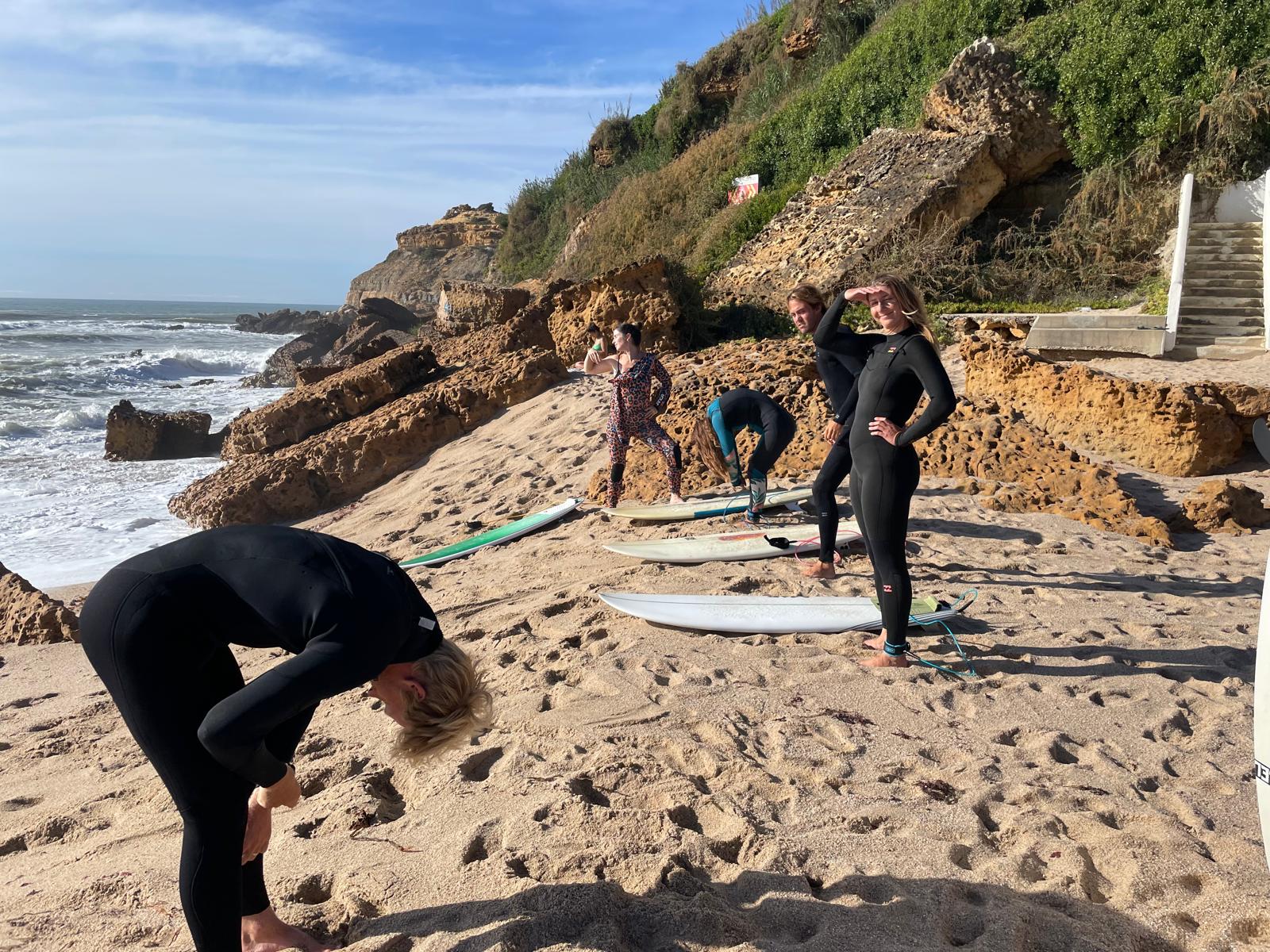 Wild Souls Coliving residents getting ready for a morning surf at Praia do São Lourenço