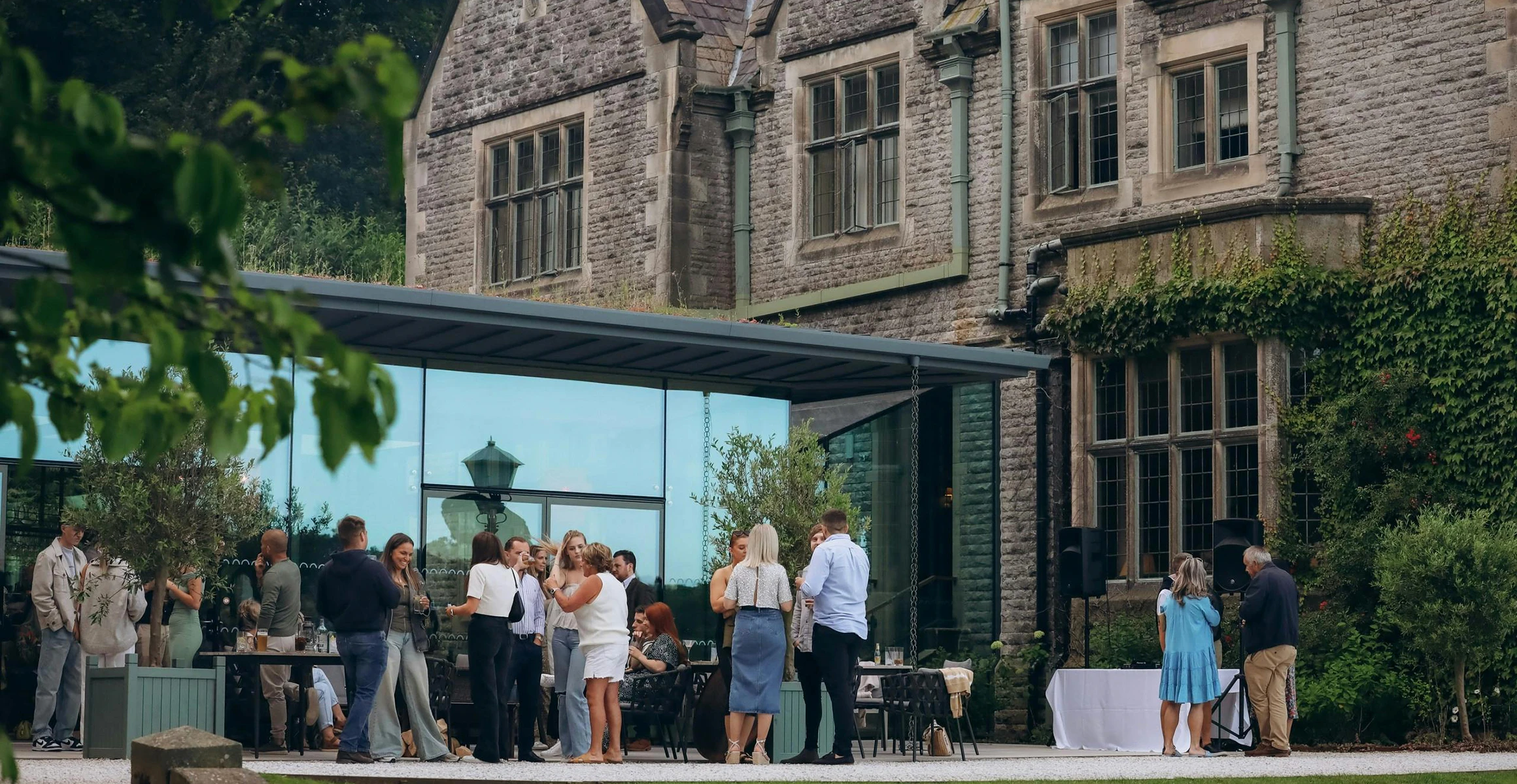 Banqueting and leisure location for hartingtons heritage tours evening meal at Wildhive at callow hall derbyshire. People enjoying a drink.