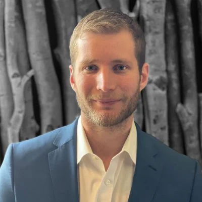 Portrait of Daniel Hayes, Co-Founder and Performance Health Advisor.