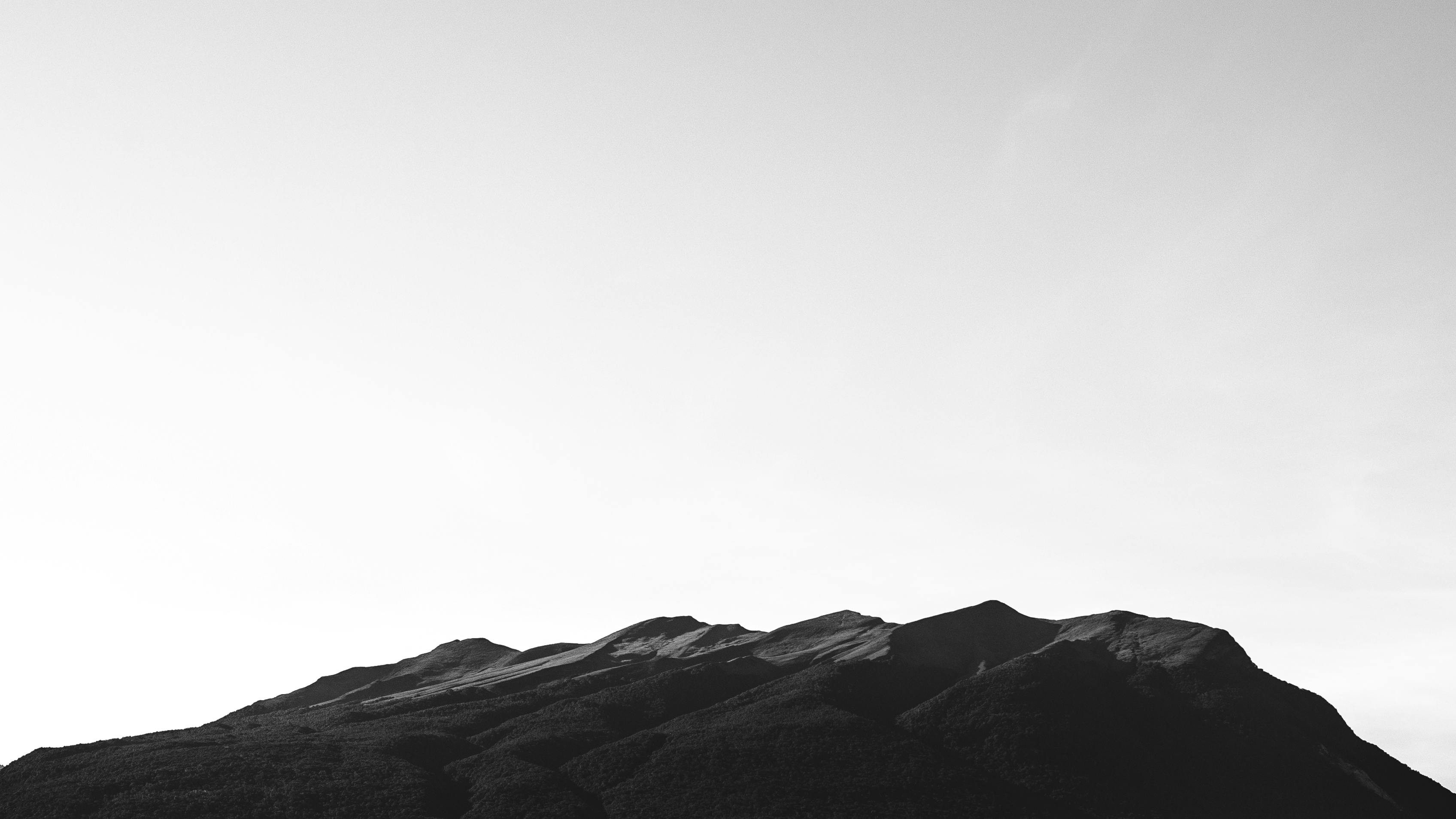 dark mountain under the sky
