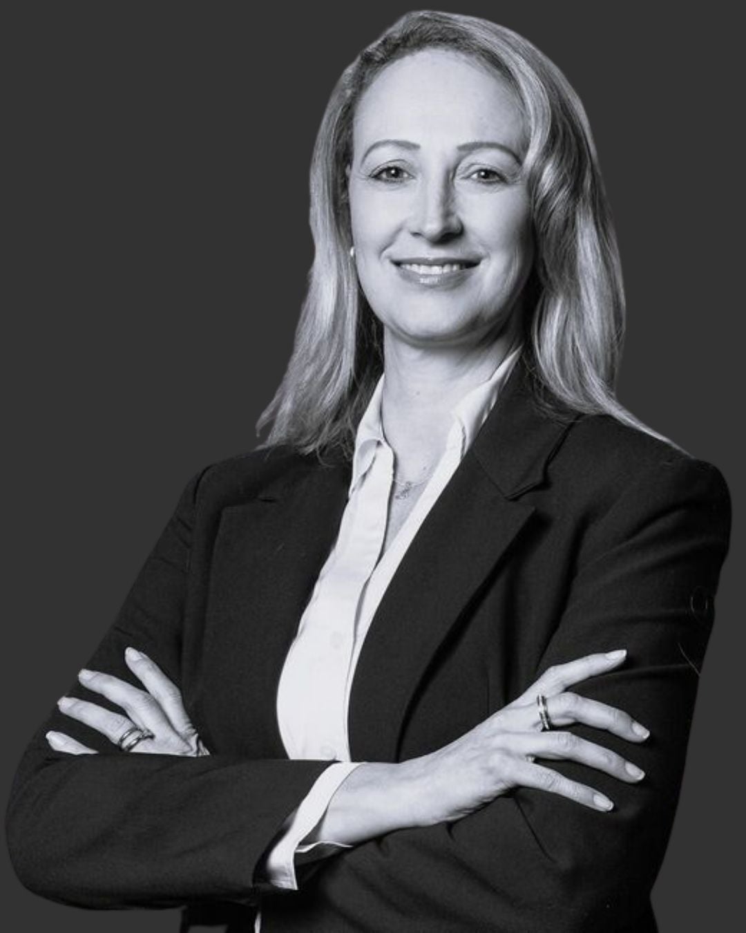 Ansa Leighton-Buys professional headshot with a plain dark background