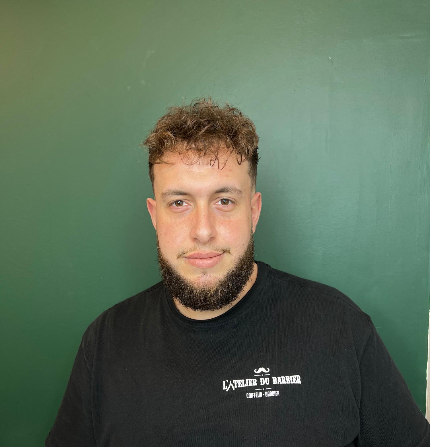 man standing near balcony