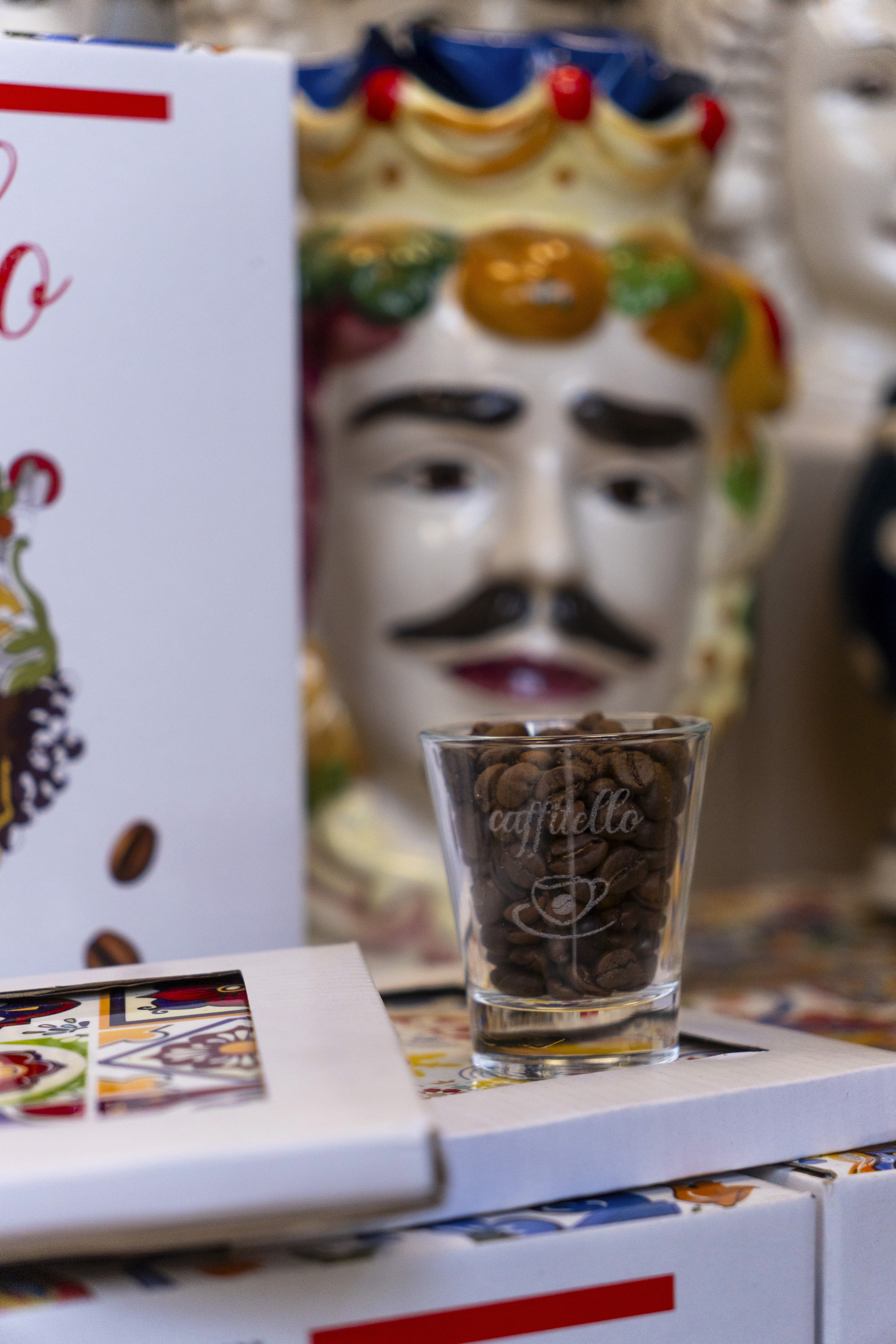 Milk swirling into iced coffee in glass
