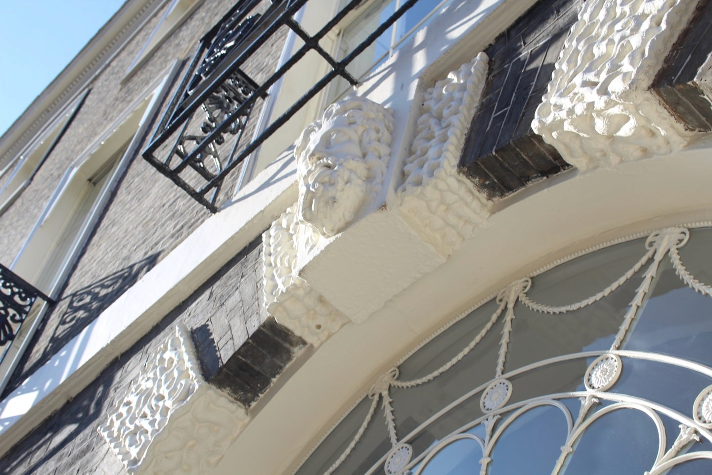 Georgian architectural detail and ironwork in daylight