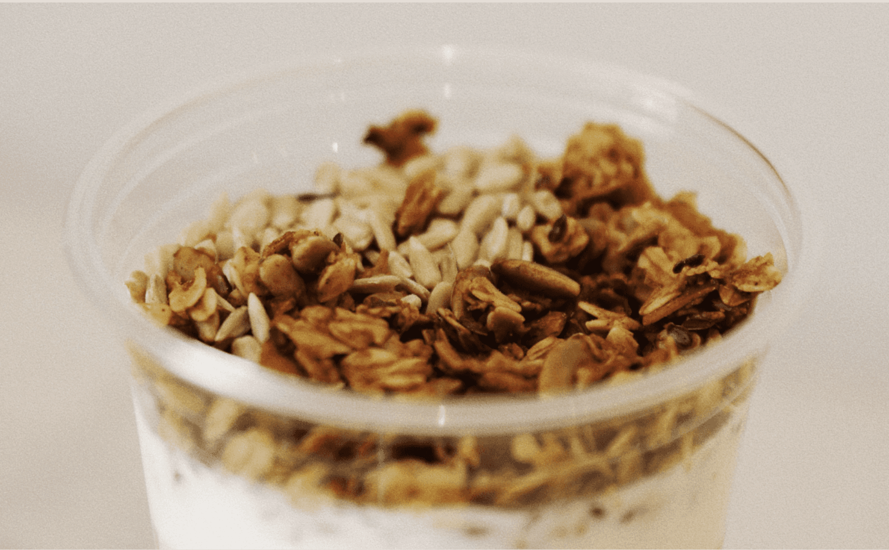 Homemade granola with seeds and yogurt served at Jo & The Sisters healthy breakfast café in Split