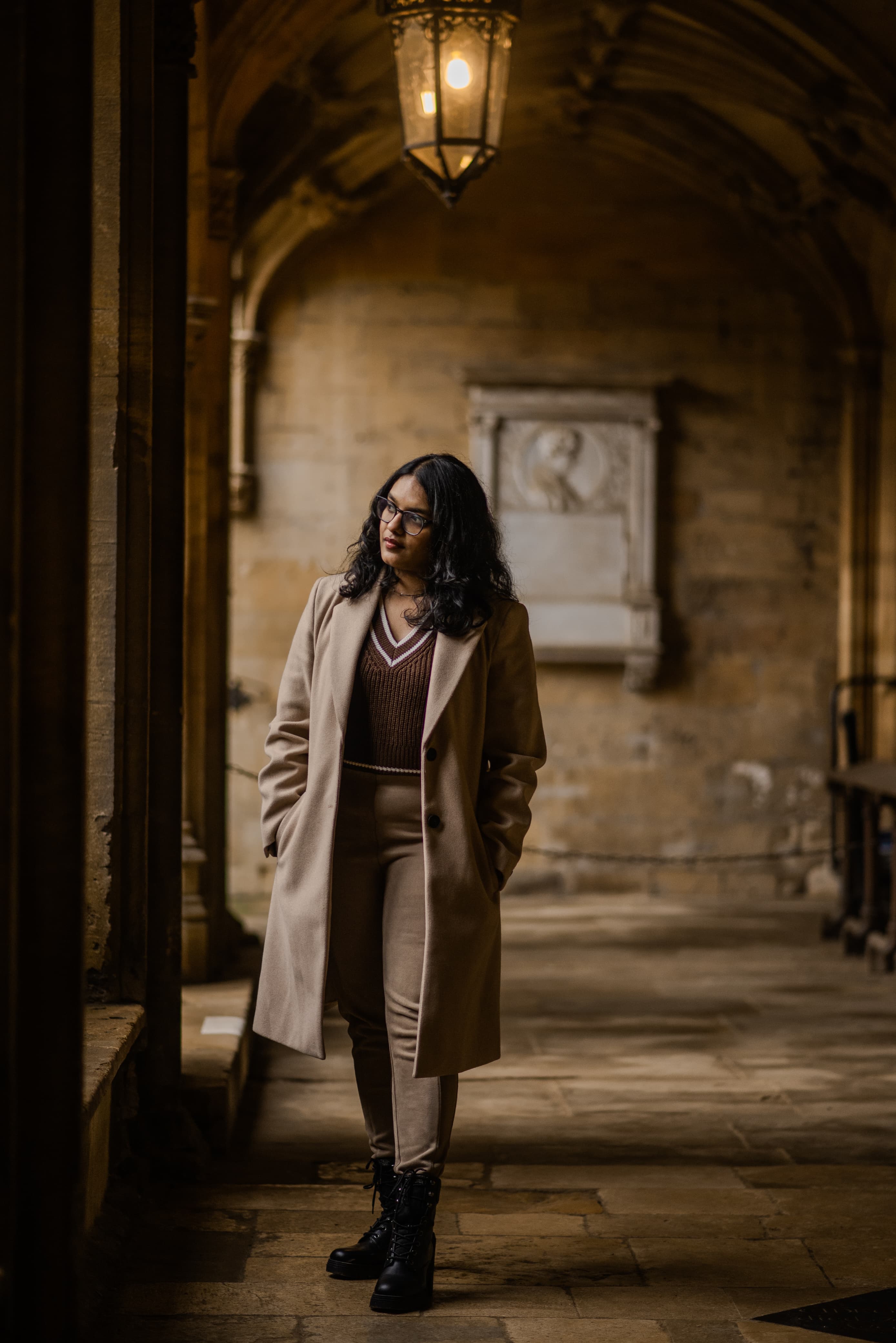 a group of people walking on a sidewalk