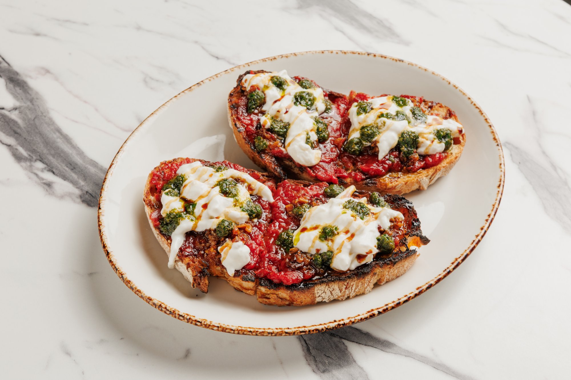 a pan of degidios meatballs for catering