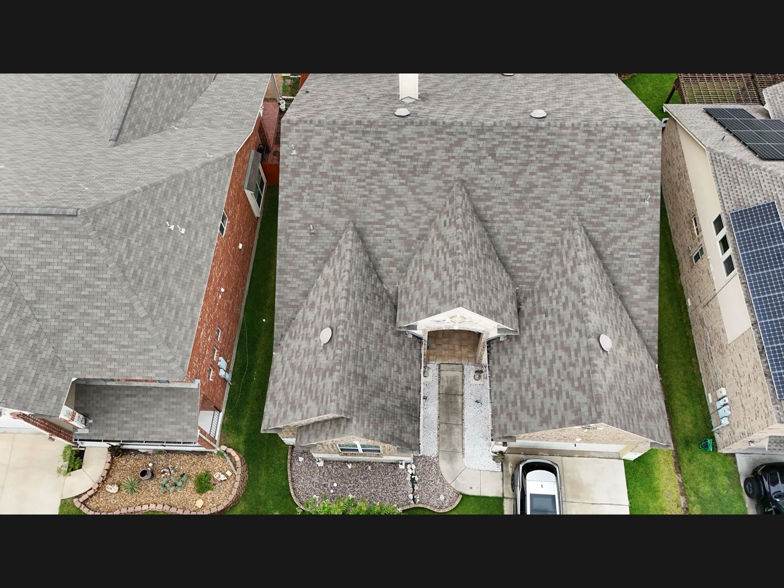 Aerial roof overview before the shingle repair in Cibolo, Texas.