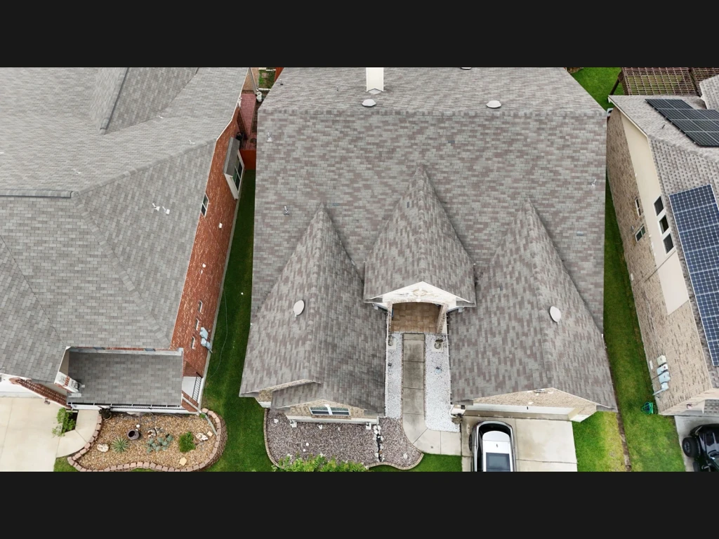 Aerial roof overview before the shingle repair in Cibolo, Texas.