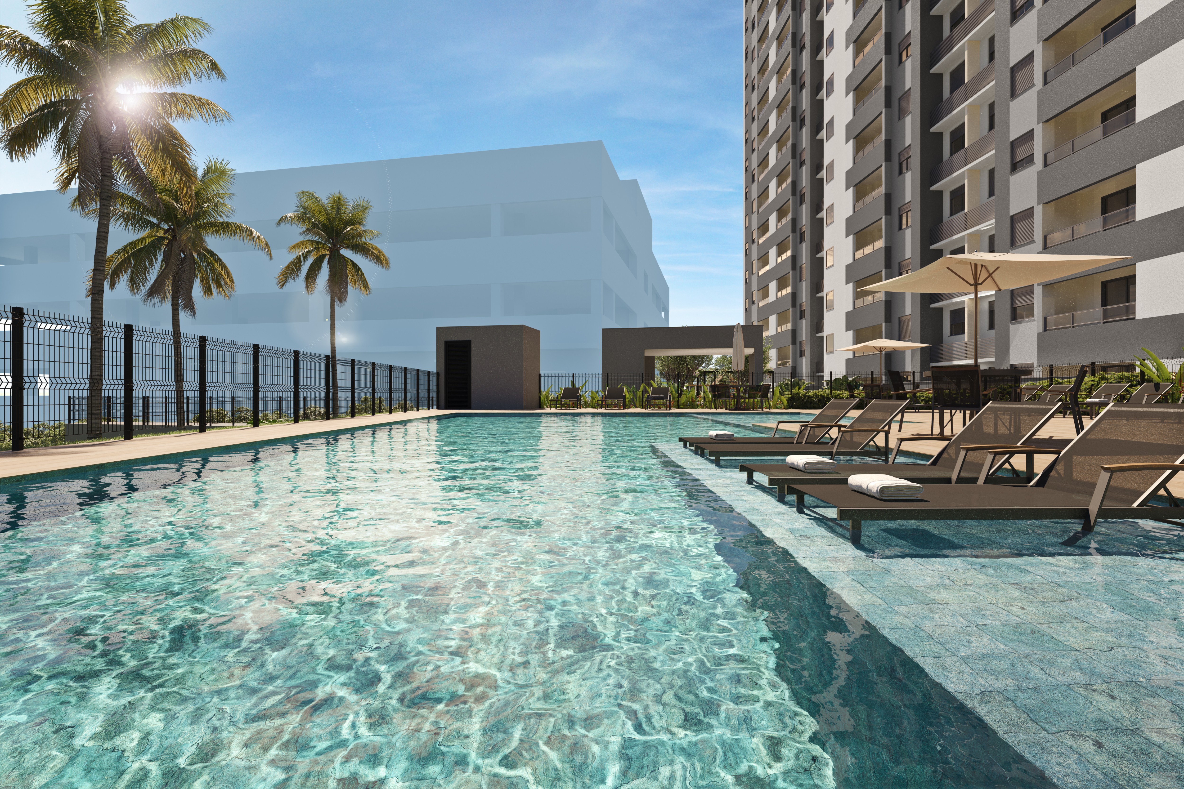 Curved modern skyscraper against a clear blue sky.