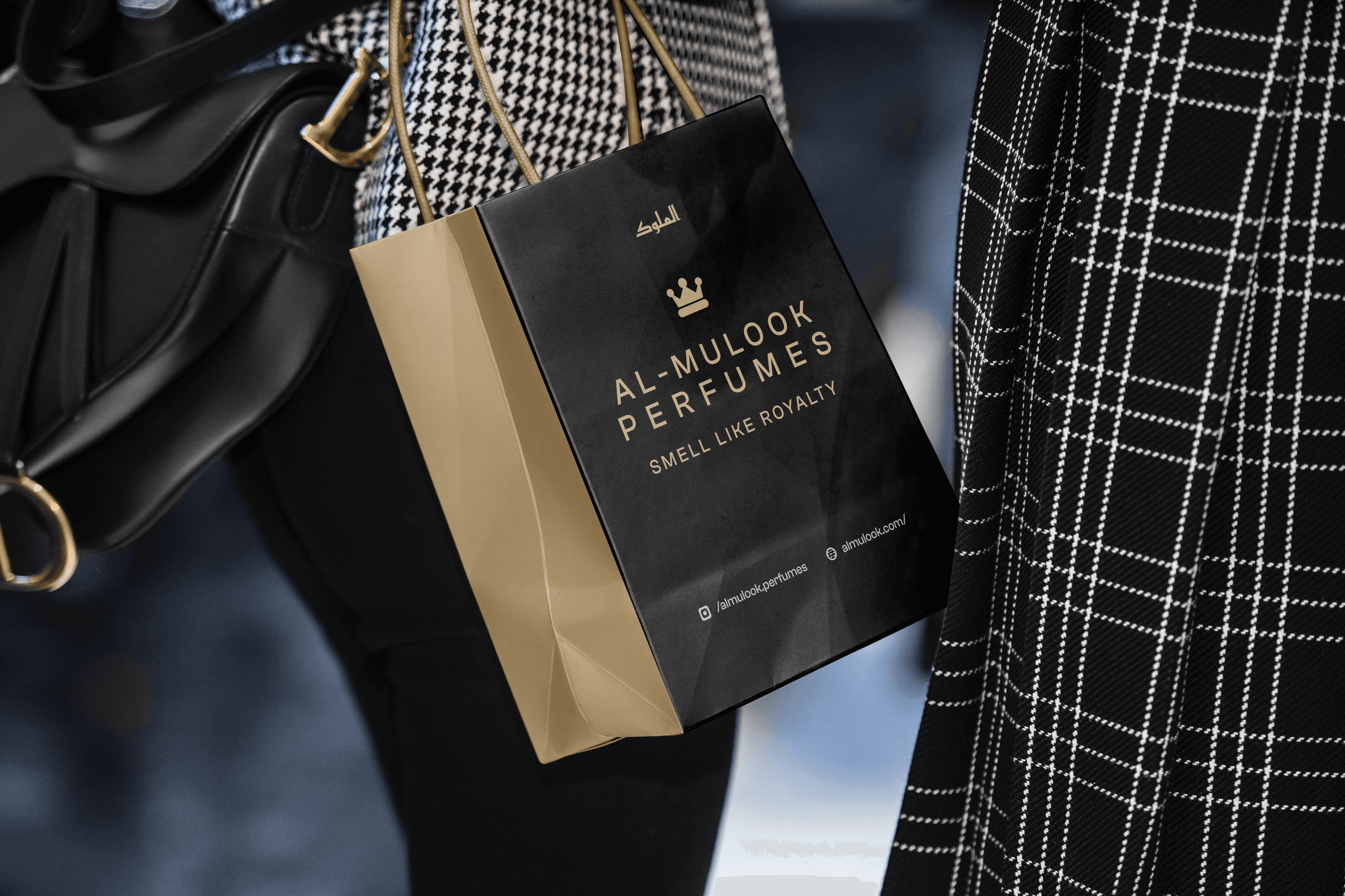 Luxury Al-Mulook packaging mockup with black and gold branding elements and premium material detailing.