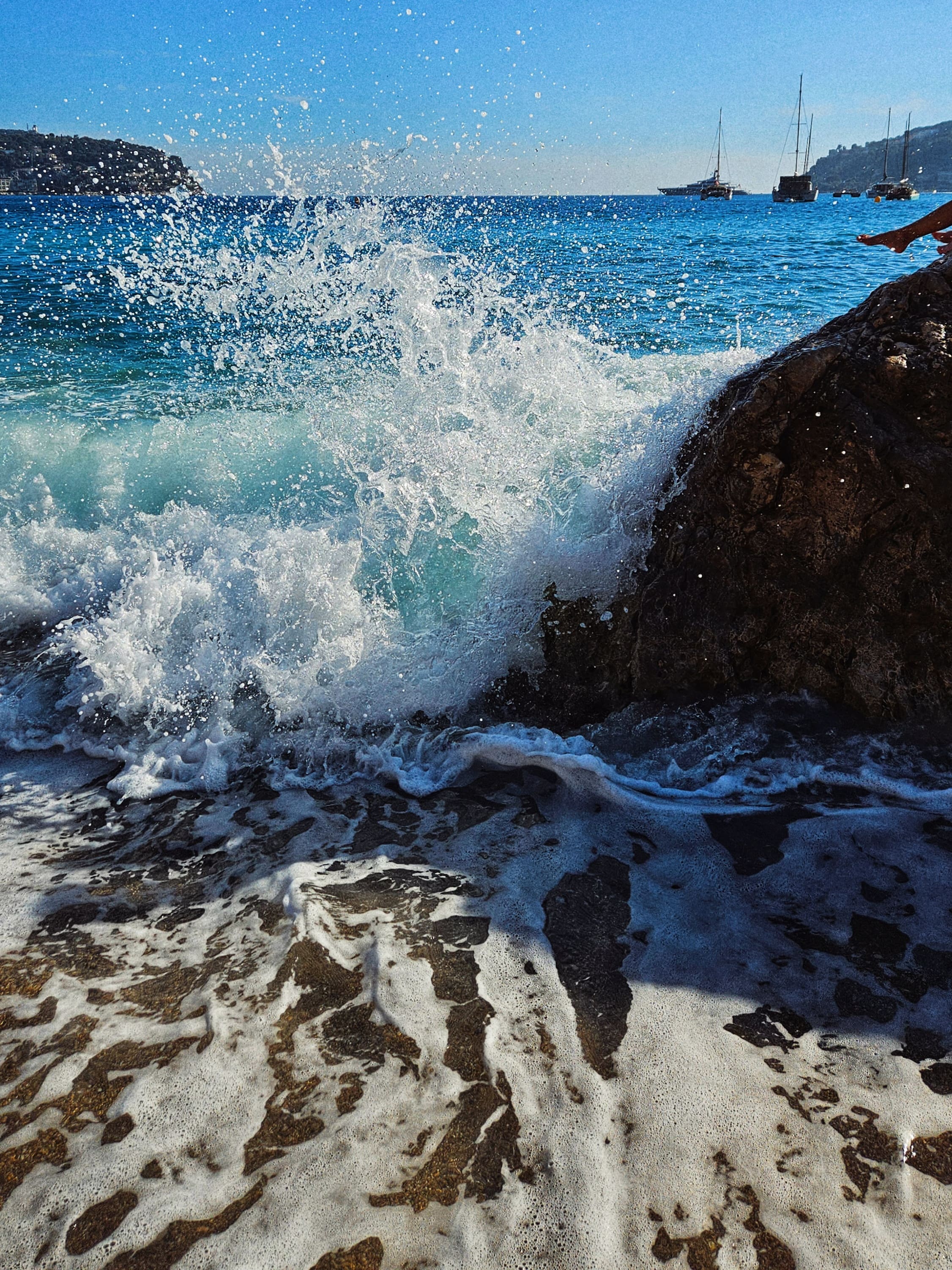 a person holding a small bowl of food