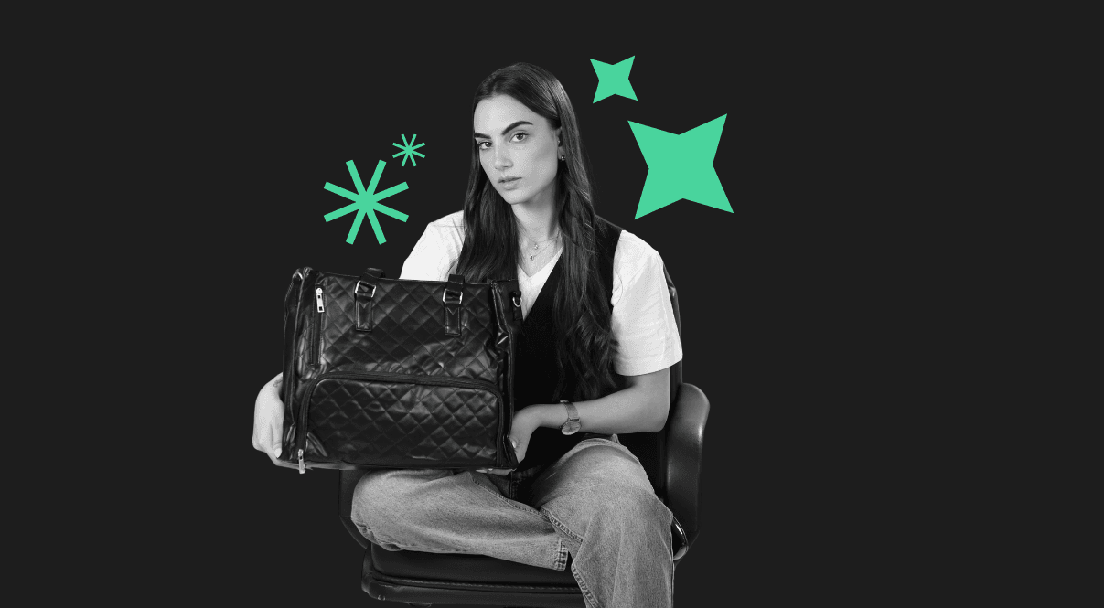model holding athena bag