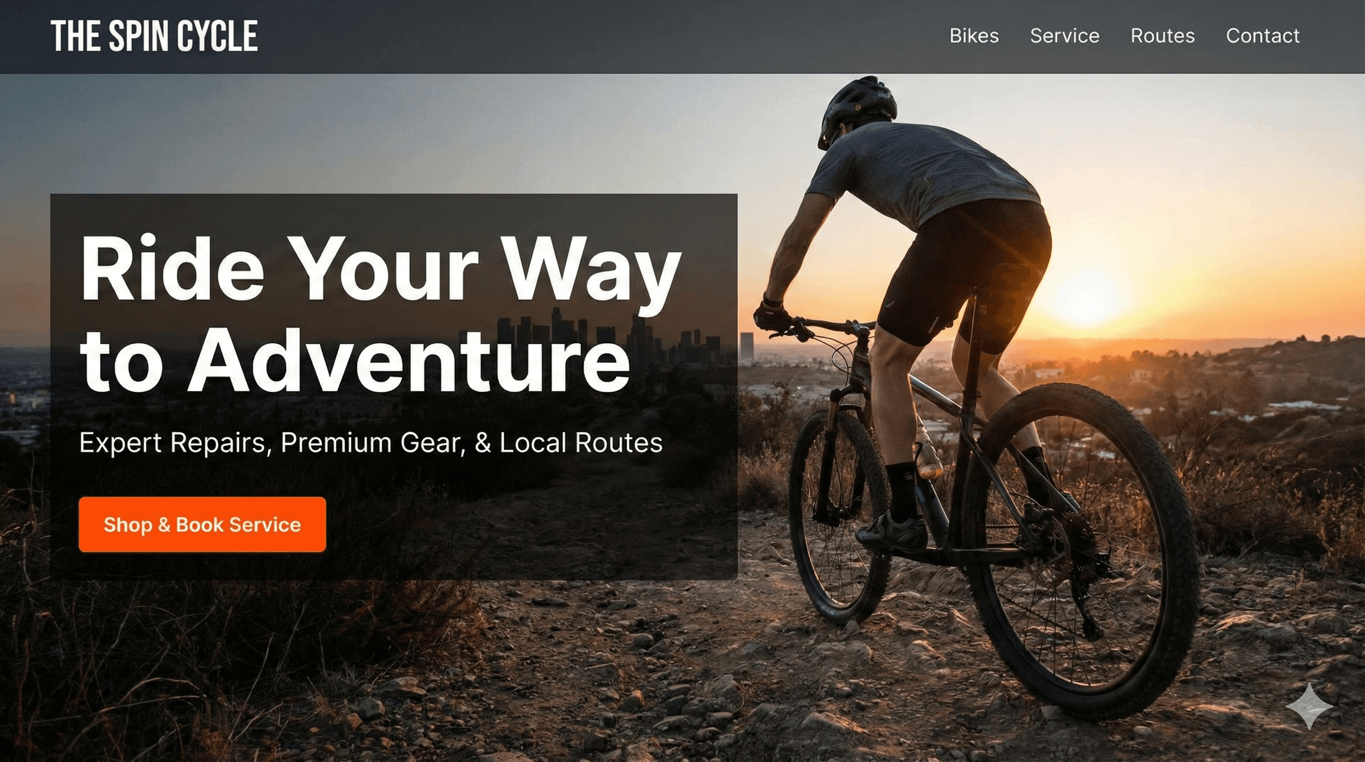 Layered blue mountains fade into a soft pink sky.