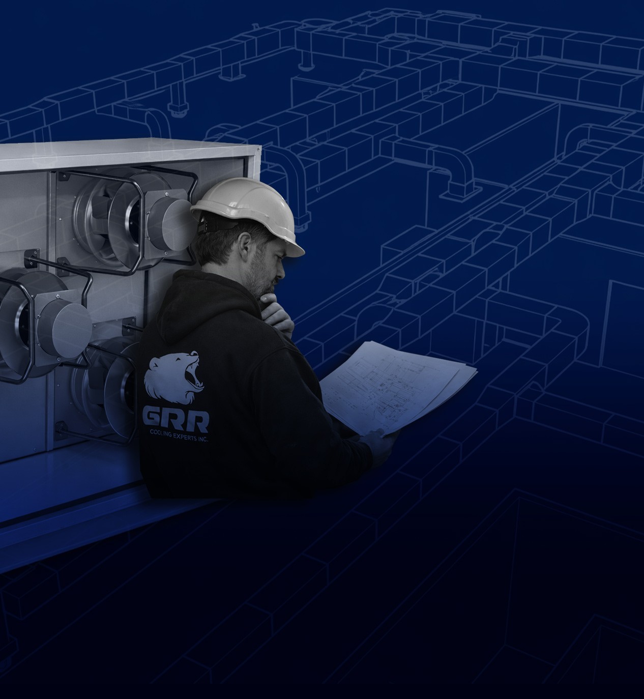 NYC HVAC serviceability checklist — GRR Cooling Experts field technician reviewing mechanical drawings beside fan array system in commercial mechanical room