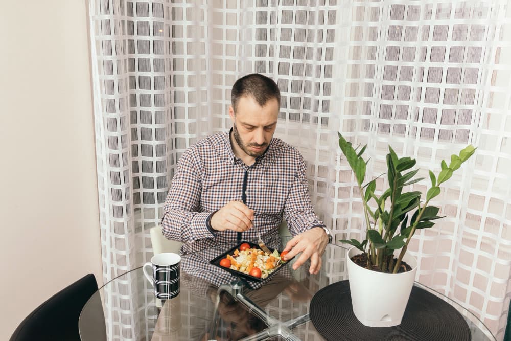 A couple of men working out in a gym