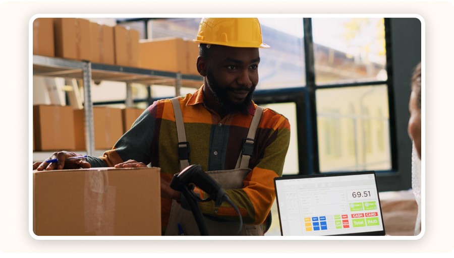 Warehouse employee scanning a package