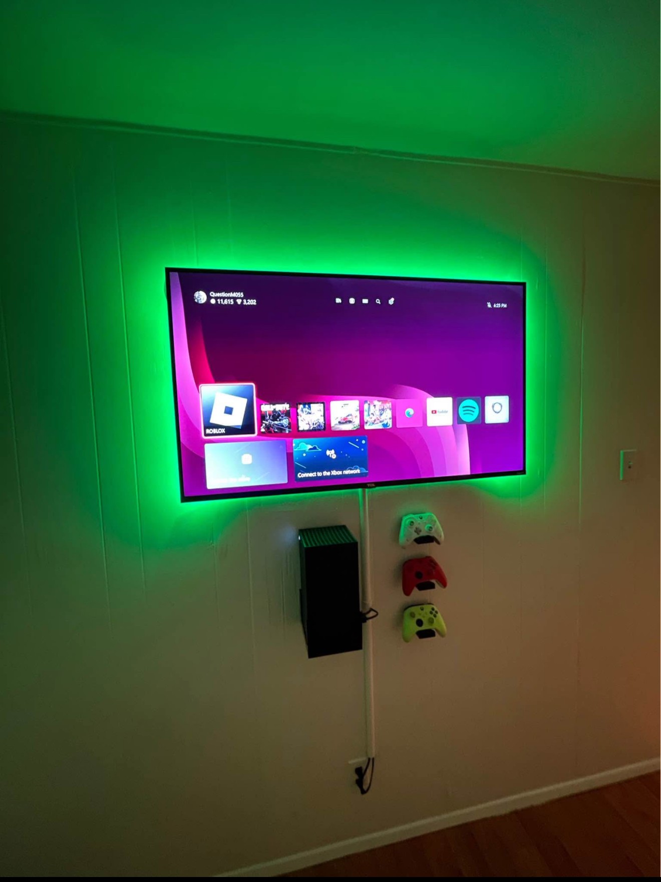 55-inch TV mounted using a above console setup in a residential home in San Diego, with clean wiring and a modern look.