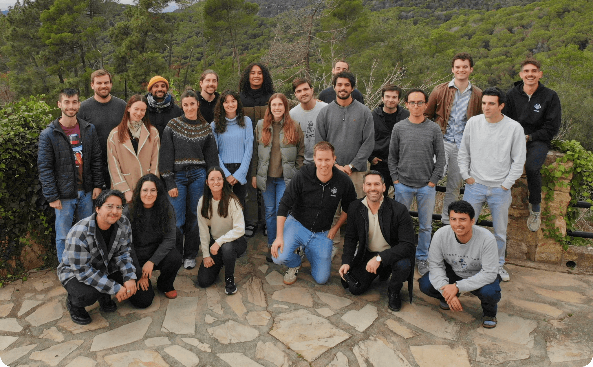 Colored photo of Astrafy team members sharing a meal together, capturing a moment of team-building in December 2024 in Belgium.