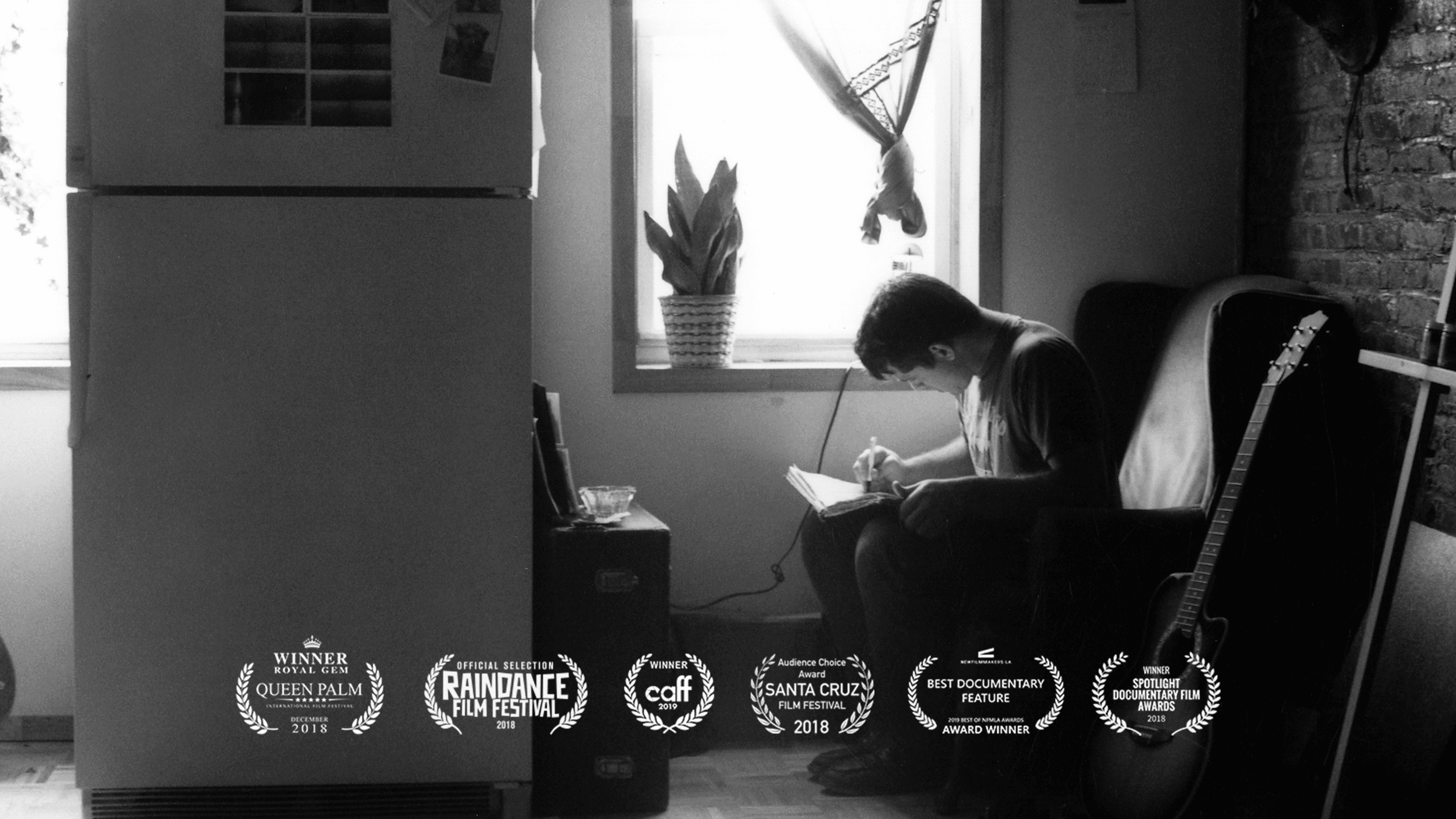 Streetside billboard with flyposters of the Batch.Works brand and illustrations