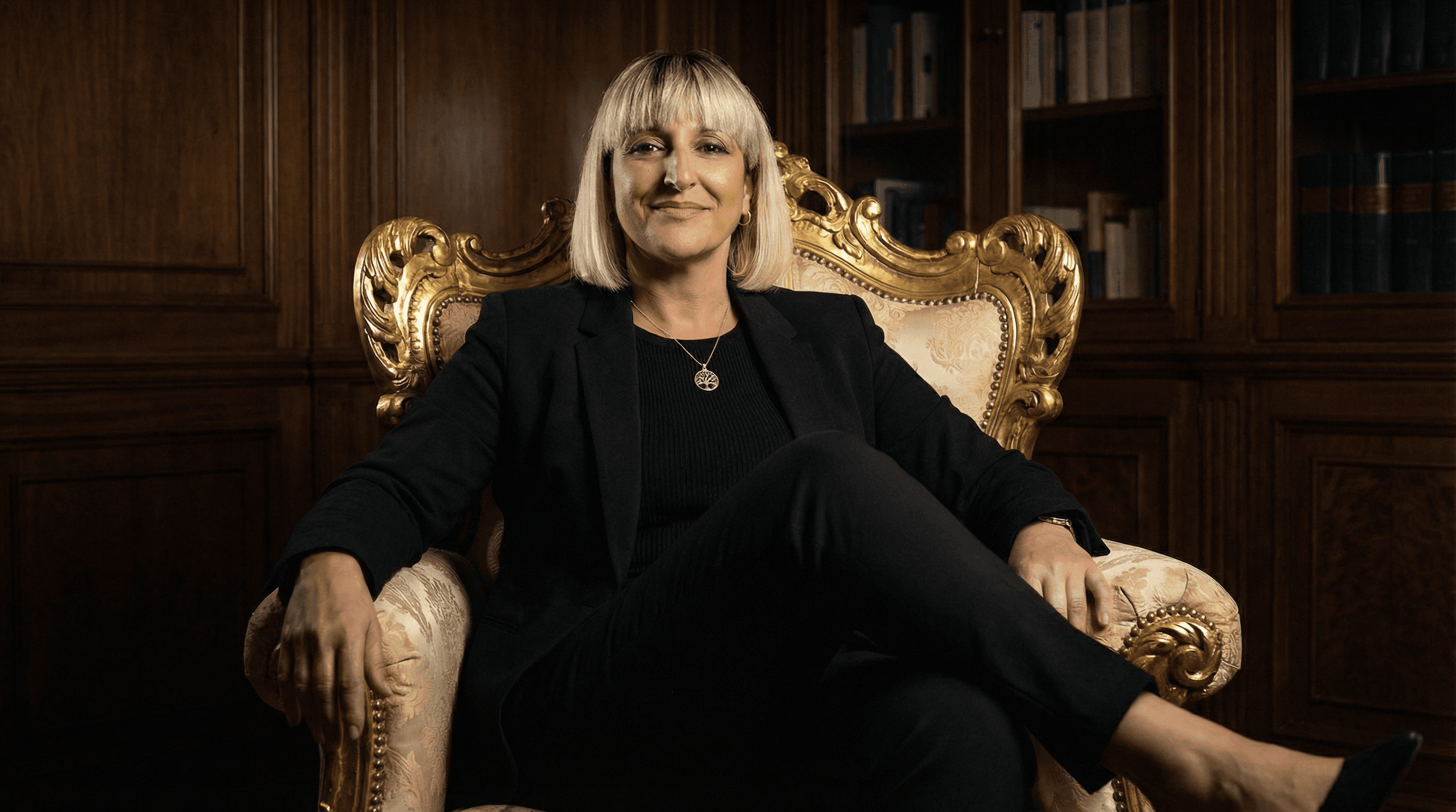 Rachel Stone standing with ABS and hands in her pockets