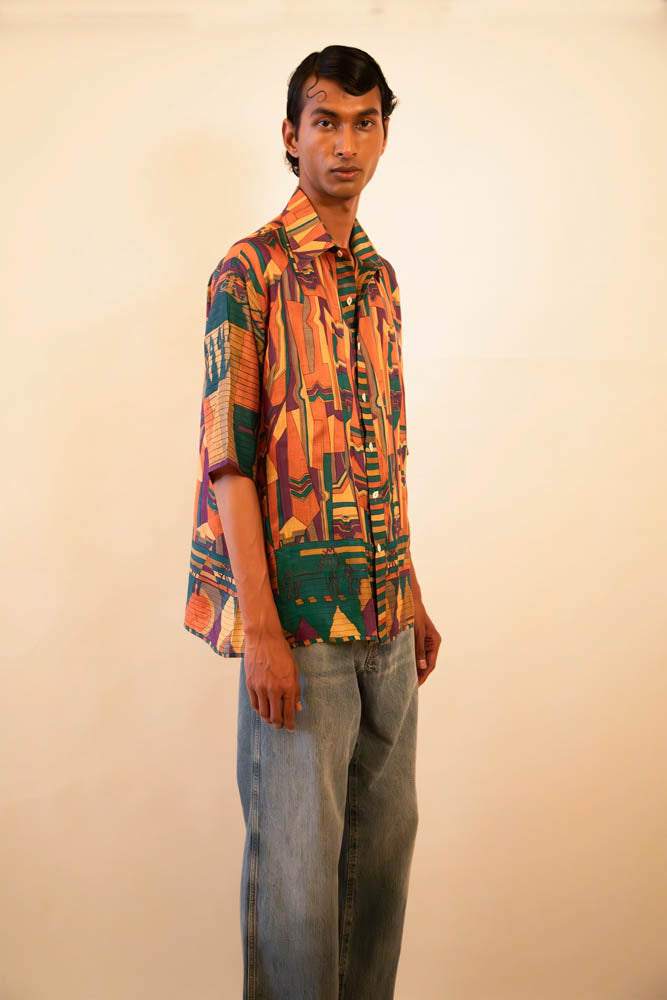 Upcycled vintage cotton shirt featuring a bold multicoloured abstract print, handcrafted with a focus on slow fashion, circular design, and artisanal heritage