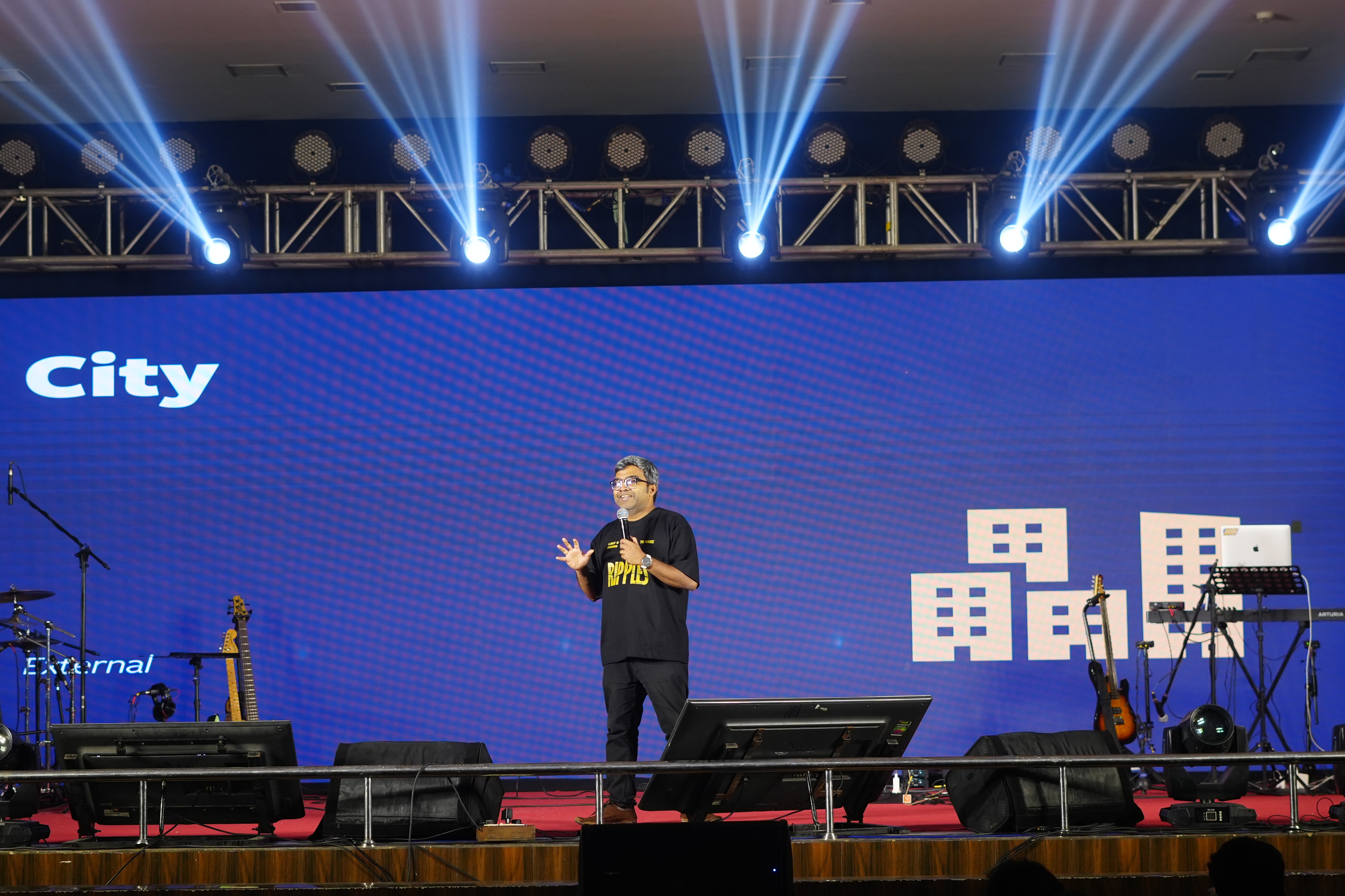 A congregation gathered inside a large hall.