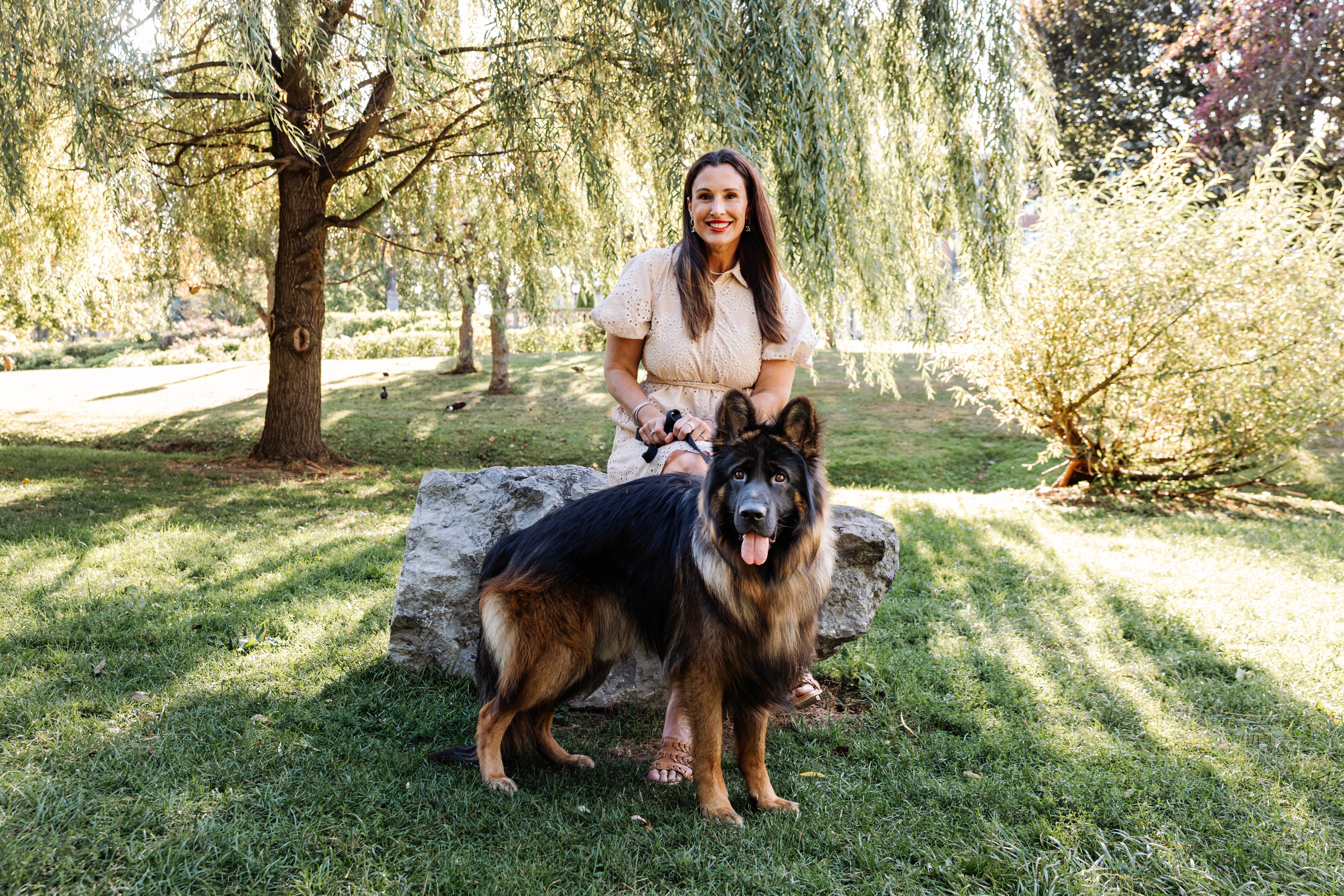 5:12 PMWoman and her beloved dog sharing a sweet moment in Congress Park, Saratoga Springs — warm, natural lifestyle and pet photography by Lizz Spano Photography, Saratoga Springs lifestyle photographer.