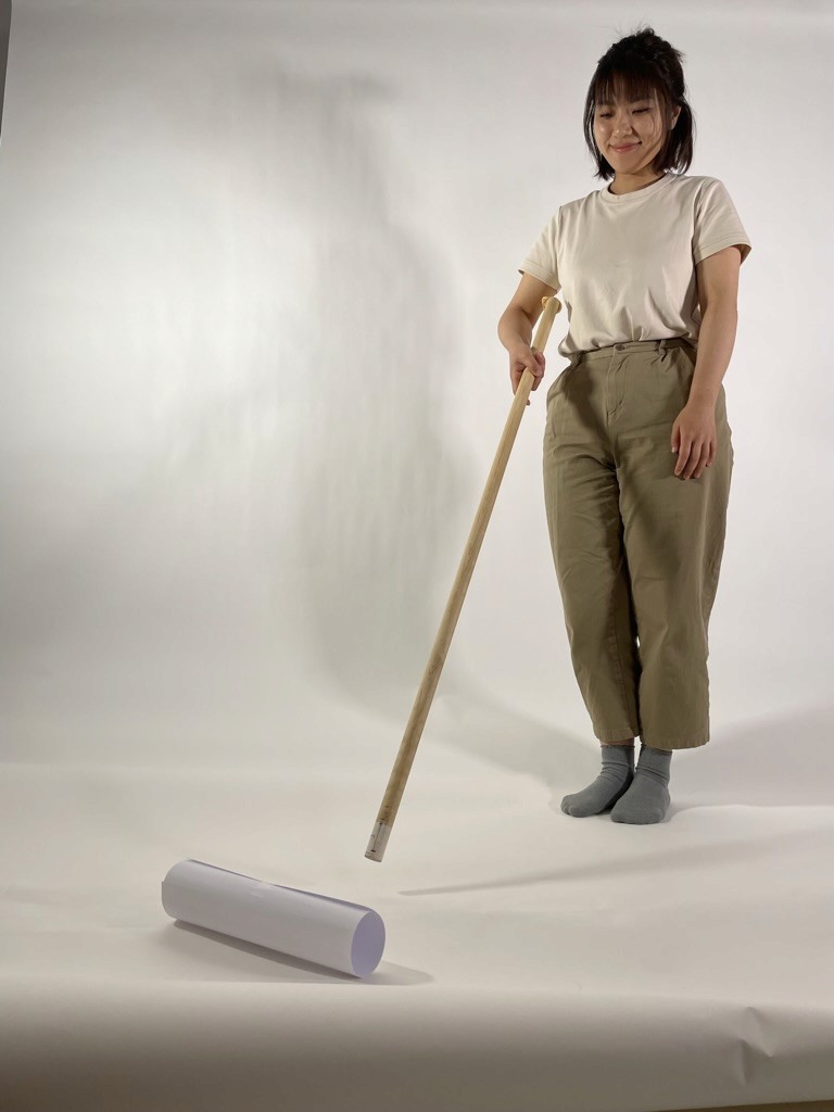 Streetside billboard with flyposters of the Batch.Works brand and illustrations