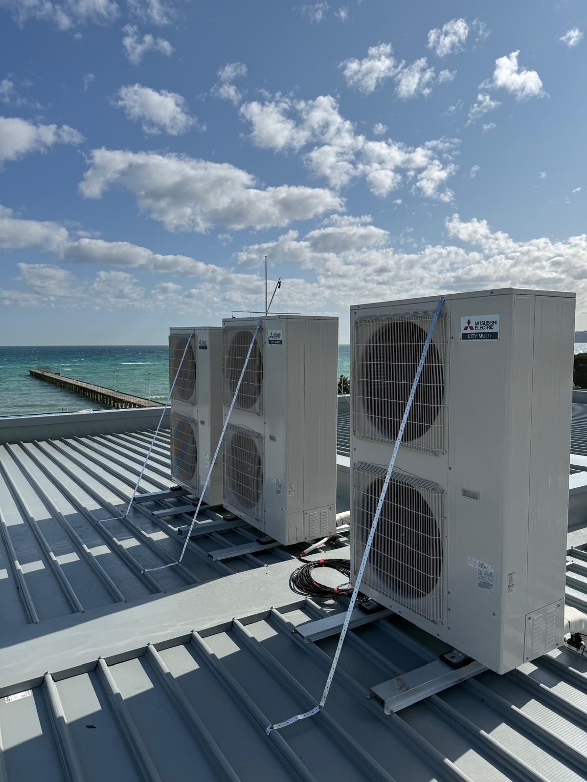 Condensors Securley Mounted On Roof