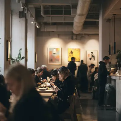 a table with plates of food and glasses of wine