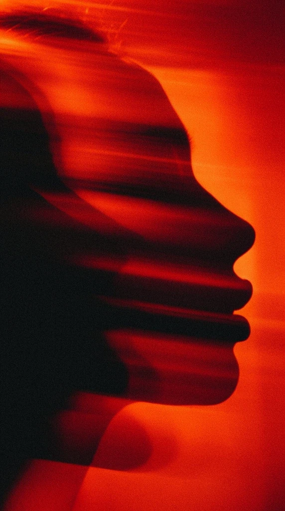 Woman in a shiny dress with light streaks