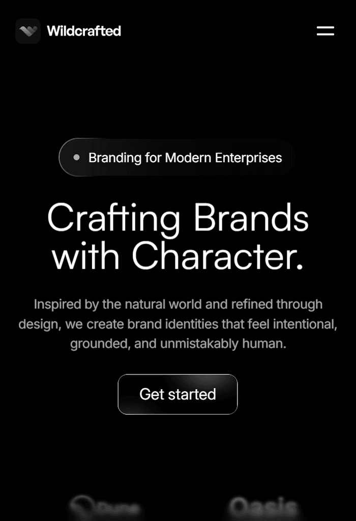 Homepage design on a black background with soft white and gray smoke elements.