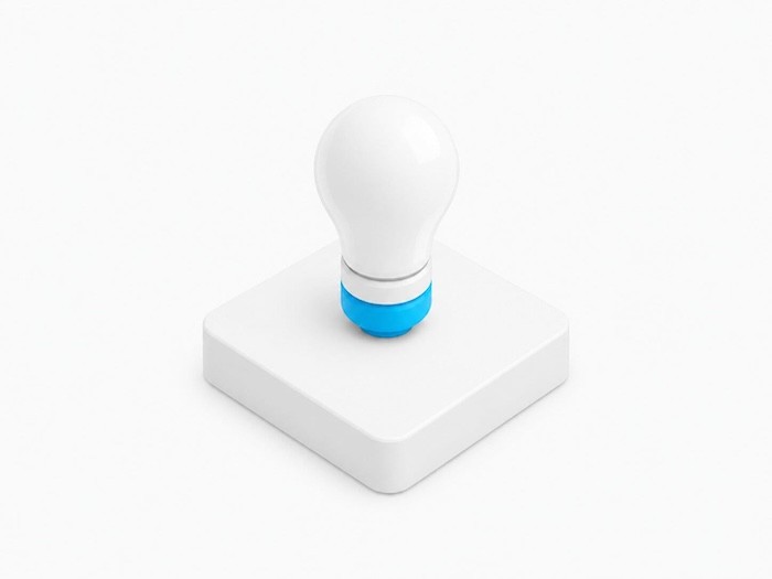 A white light bulb with a blue base, displayed on a white platform against a white background.