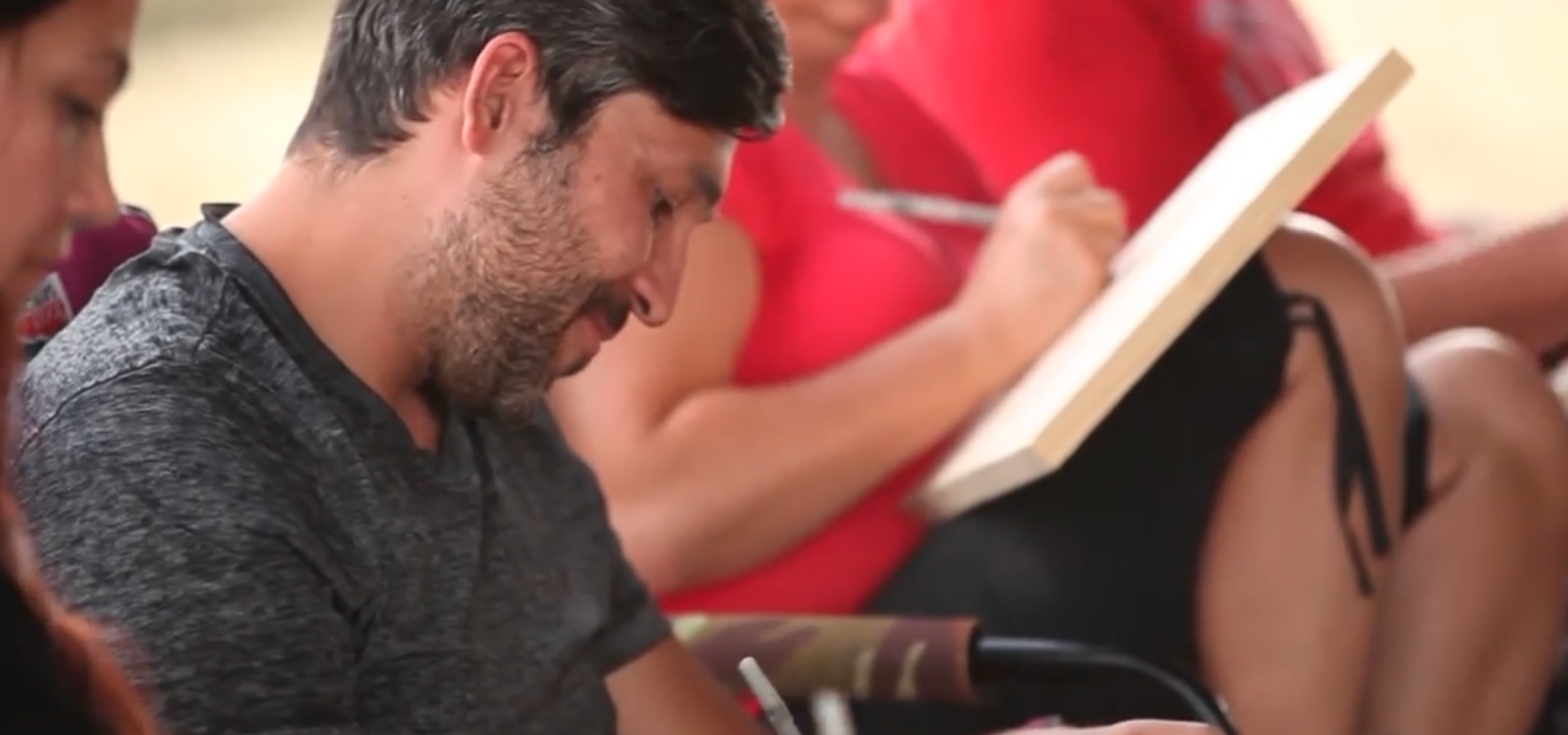 Man with surfing with paddle