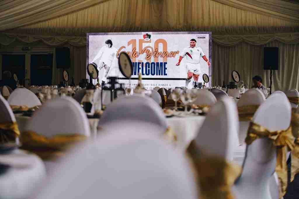 man holding rugby ball