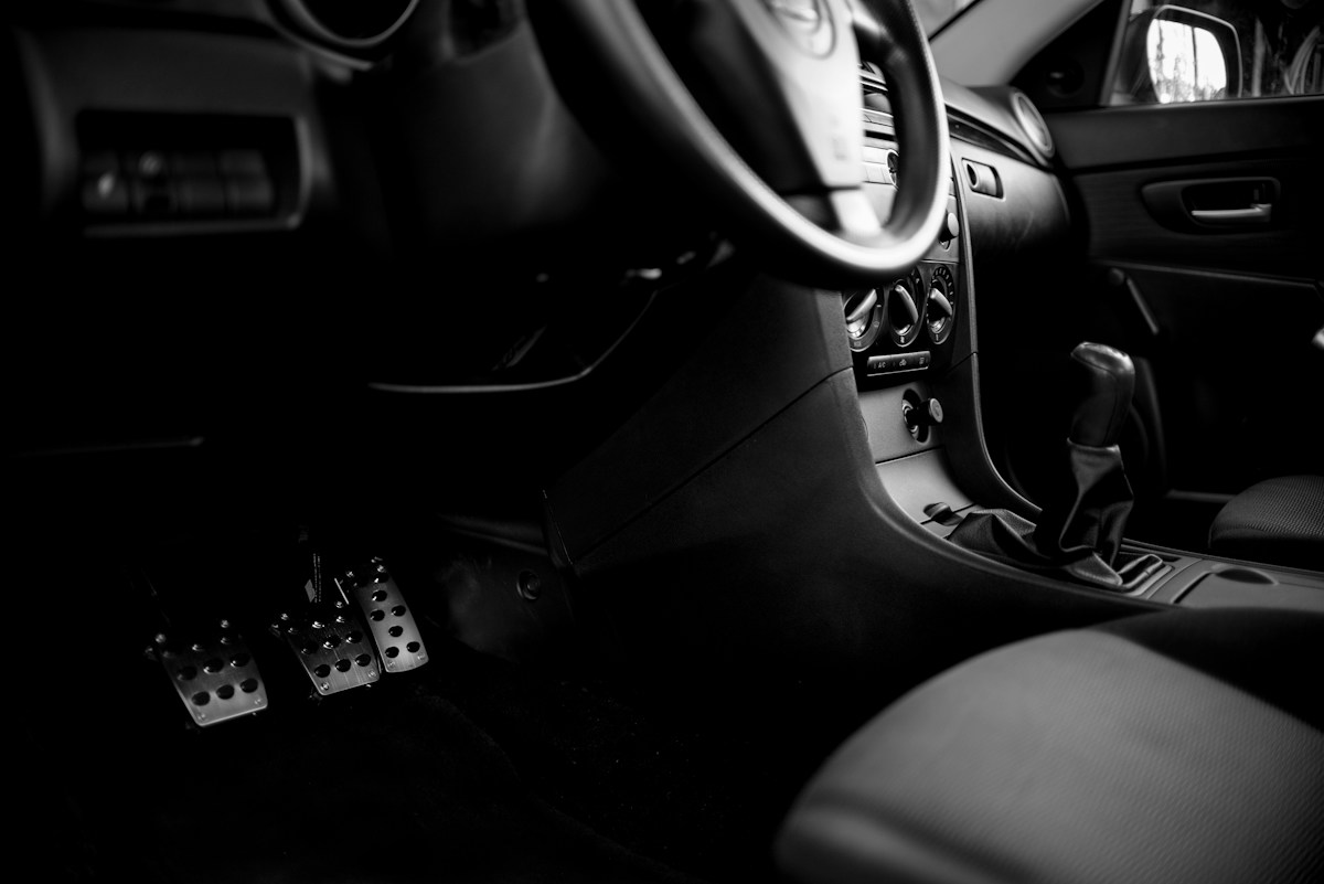 Vehicle interior carpeting before detailed sand removal