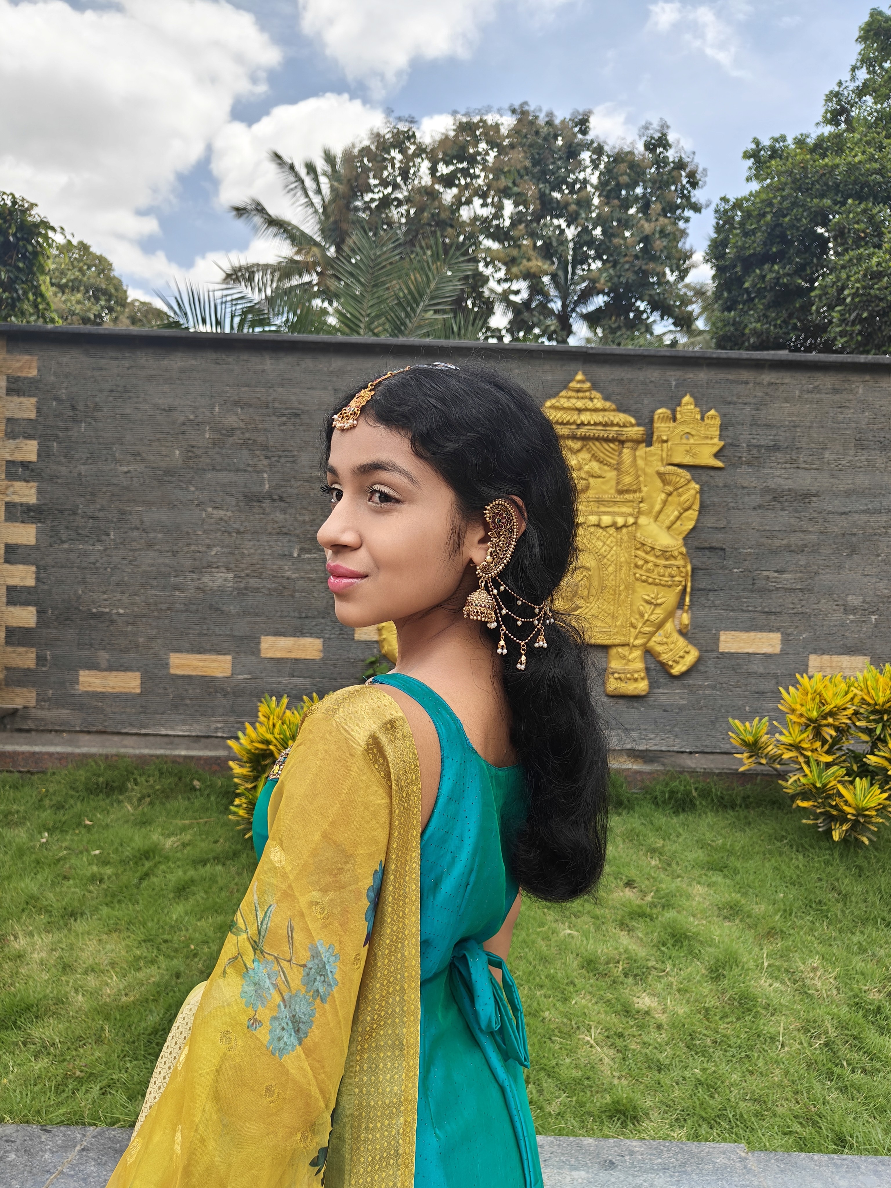 Sheersha posing wearing a sharara