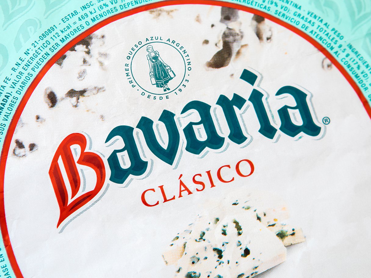 Rooftops of a coastal town with the sea in background