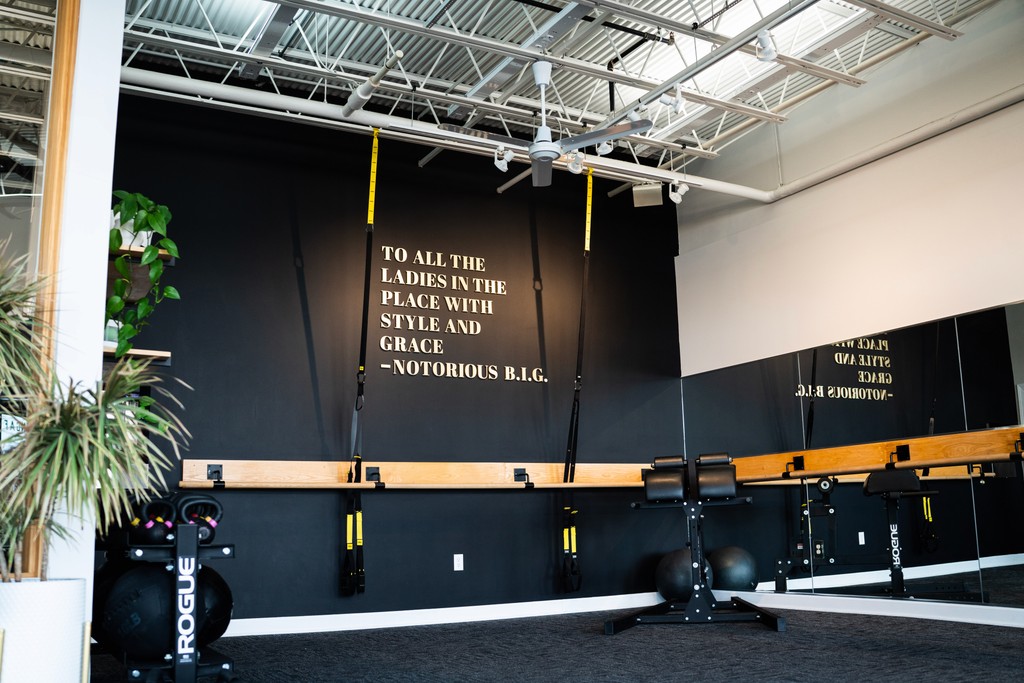 Gym Instructor with boxing gloves in Anchor Fitness Pewaukee