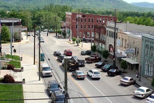 Mountain town scenery of Irvine KY, with dumpster rental services for cleanups and construction