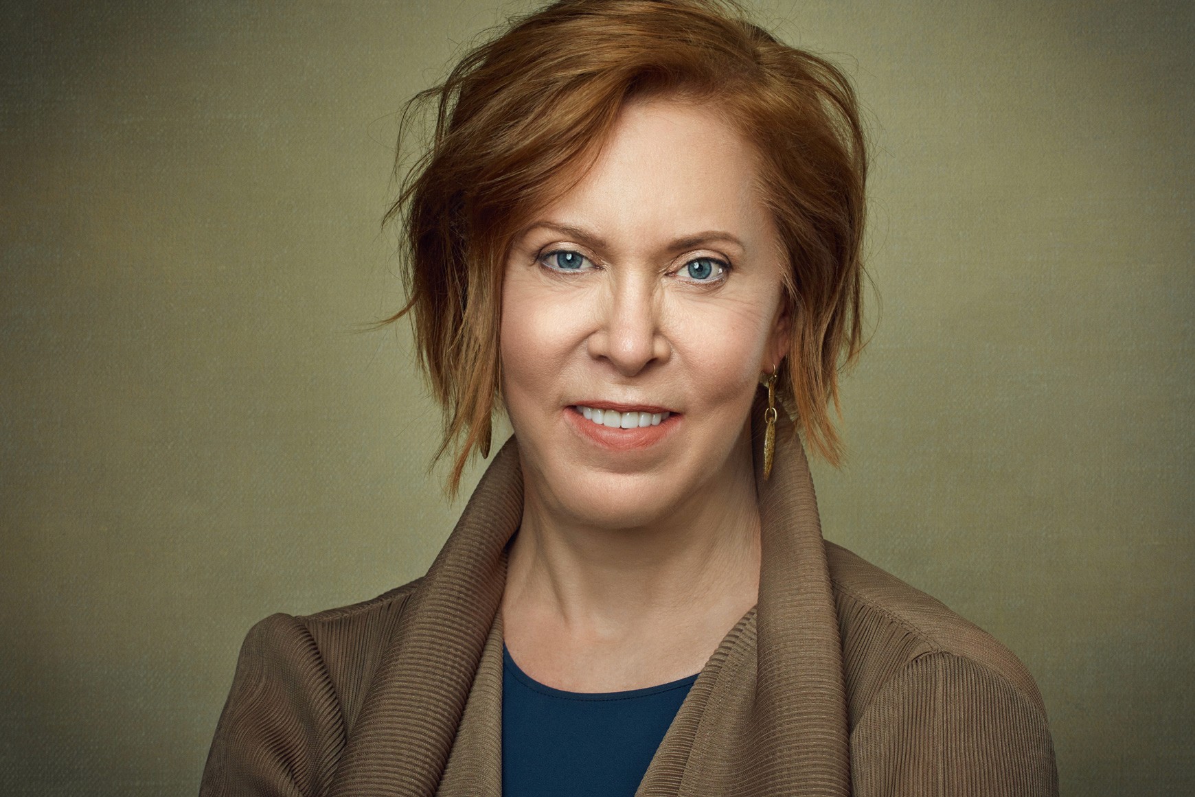 Trustworthy headshot of a mature woman smiling, perfect for consultants, therapists, and board members. Professional profile pictures Bay Area.