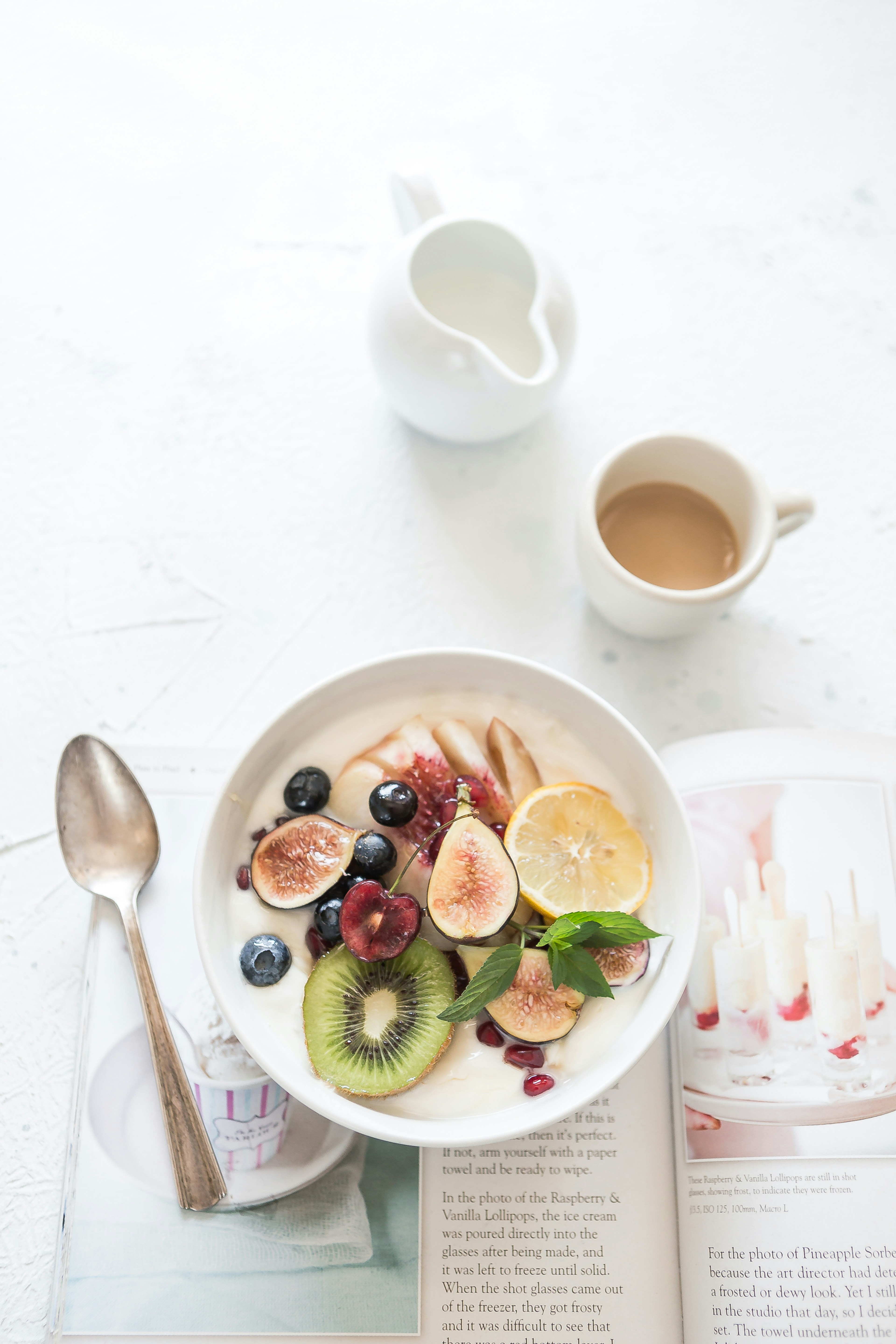 Bowl of cereal and cup of coffee on a table