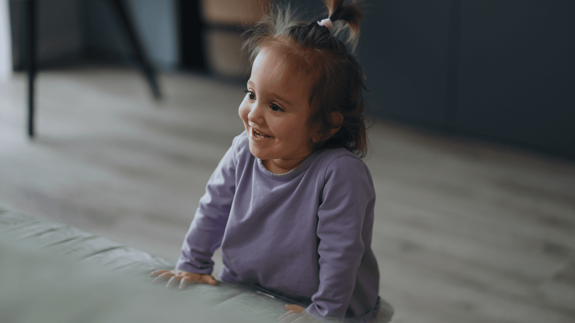 Little girl smiling.