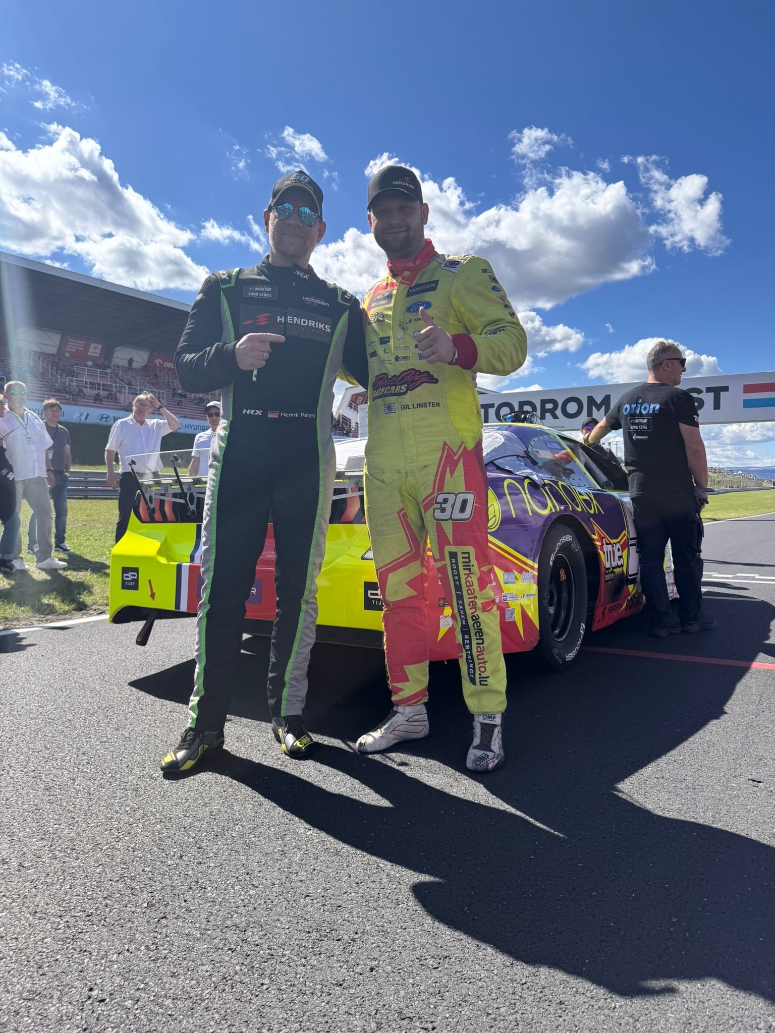 Henrik Peters and Gil Linster in front of Car Number 50 at Autodrom Most
