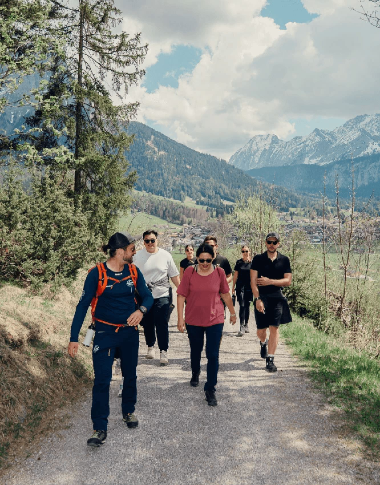 a woman in a dress sitting on a couch