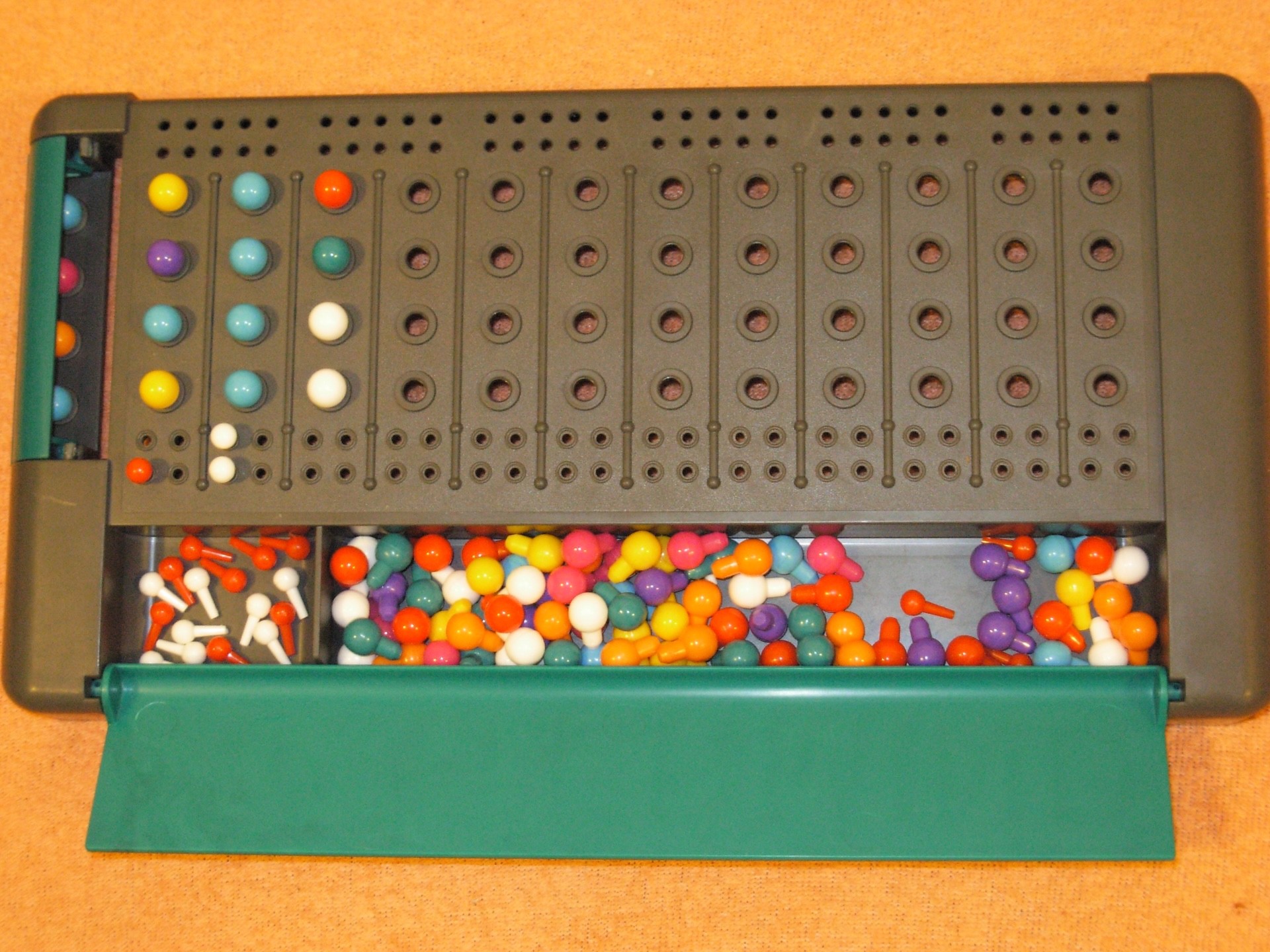 Mastermind - pin-based puzzle game from 70s