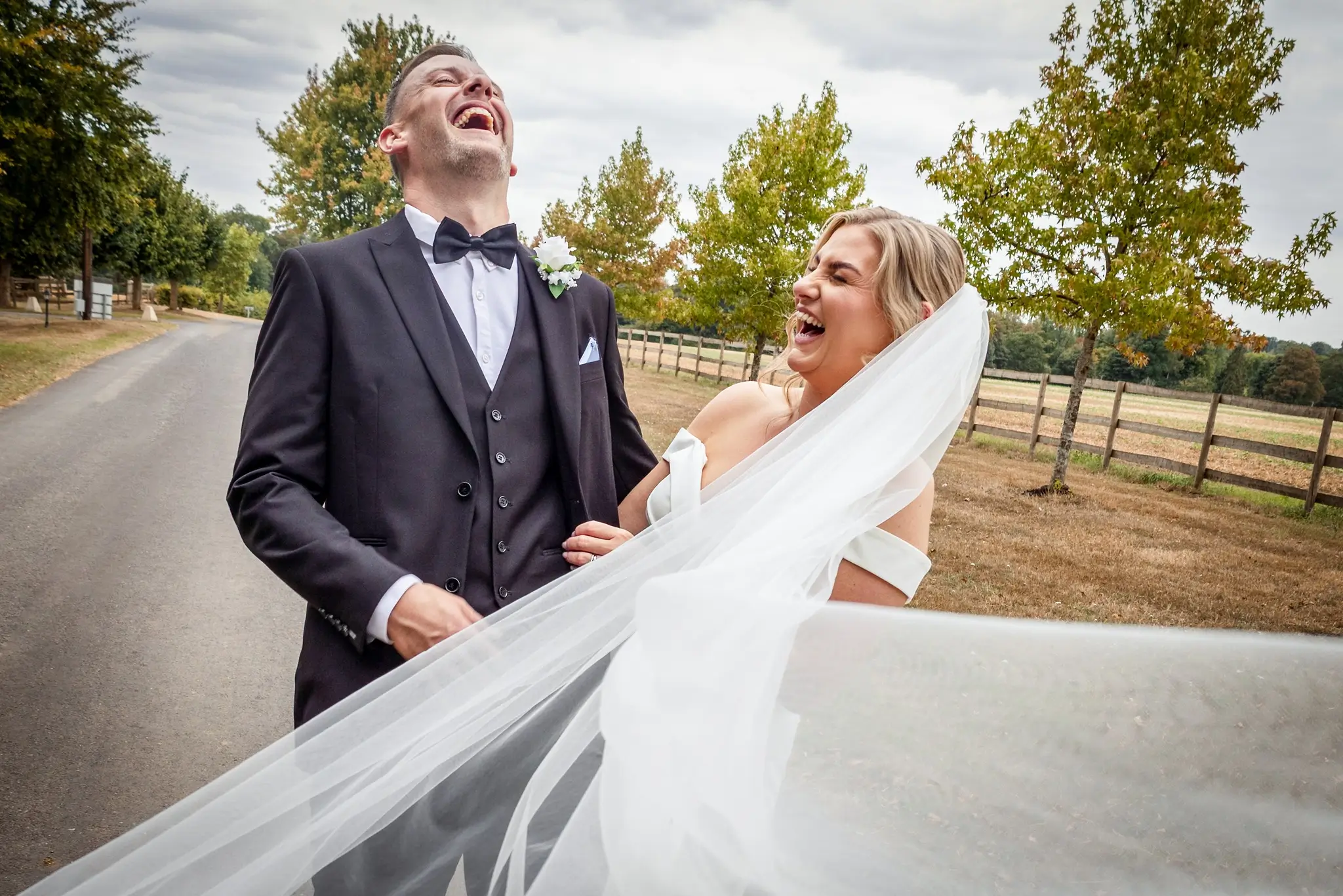 Just married wedding couple sharing a laugh together