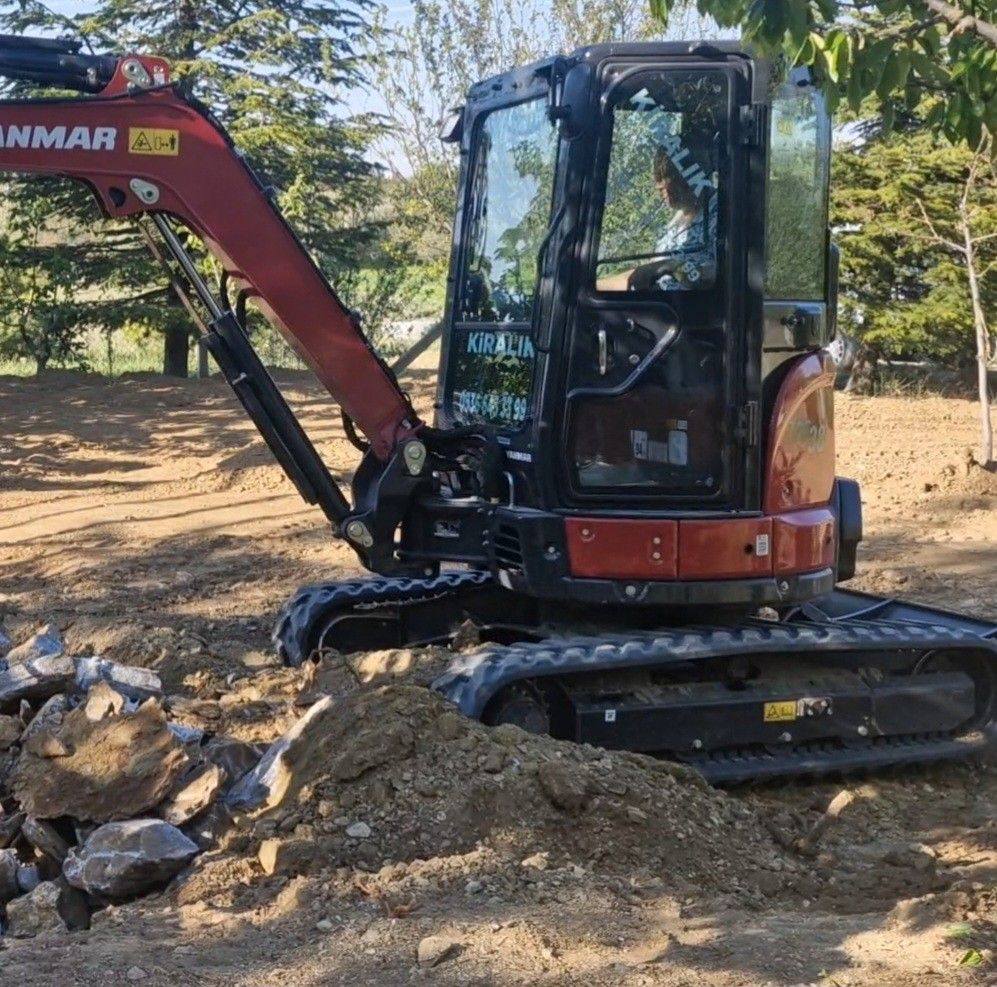 A person wearing the white shirt looking at the left