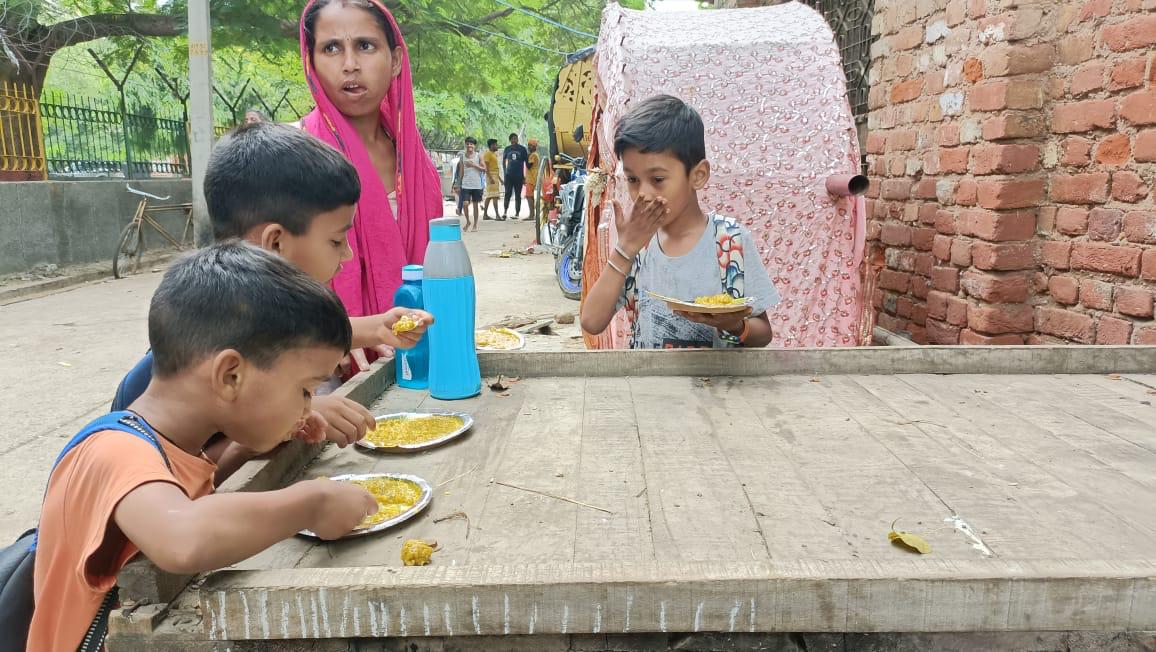 selective focus photography of girl drinking water